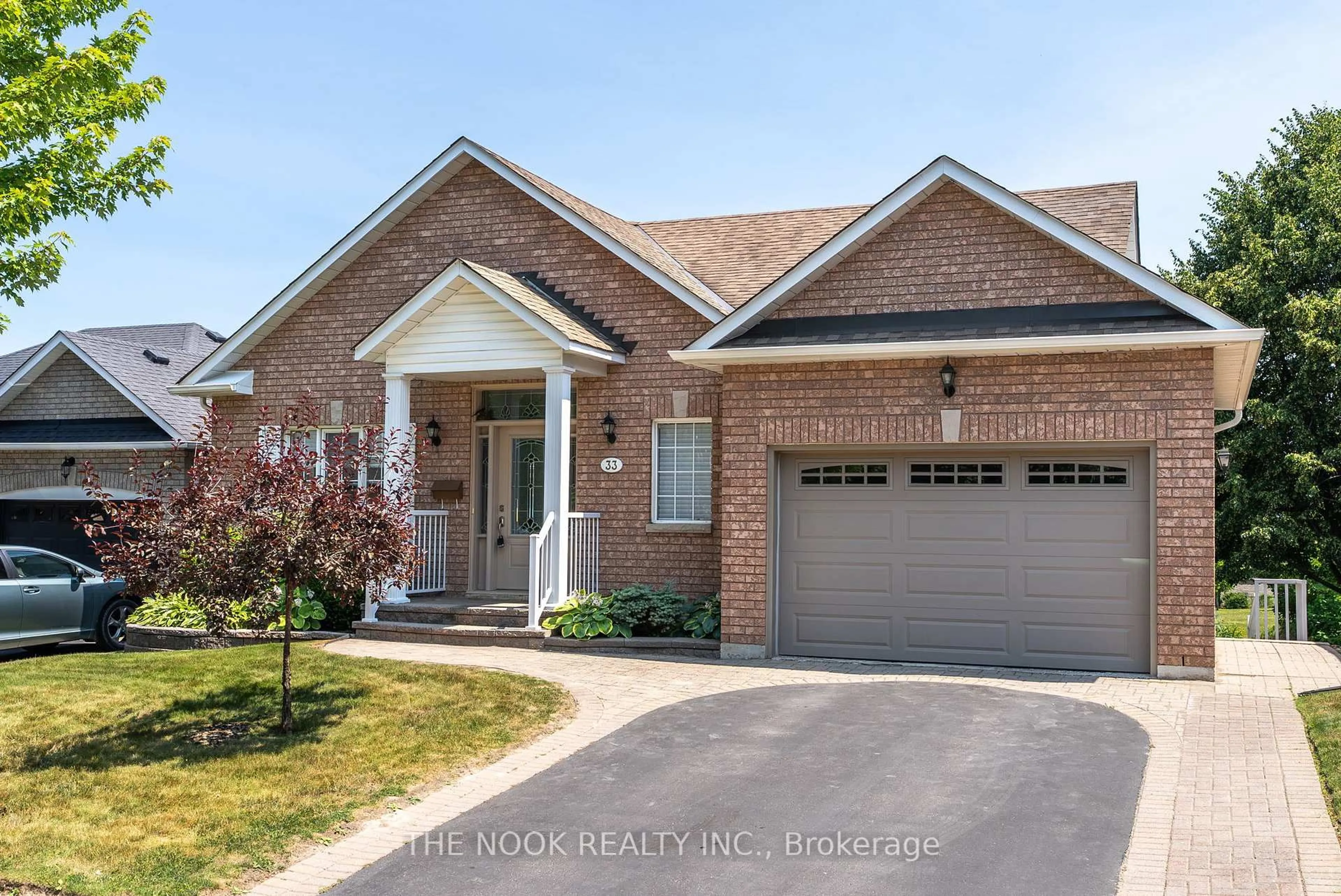 Home with brick exterior material, street for 33 Commons Blvd, Scugog Ontario L9L 1S5