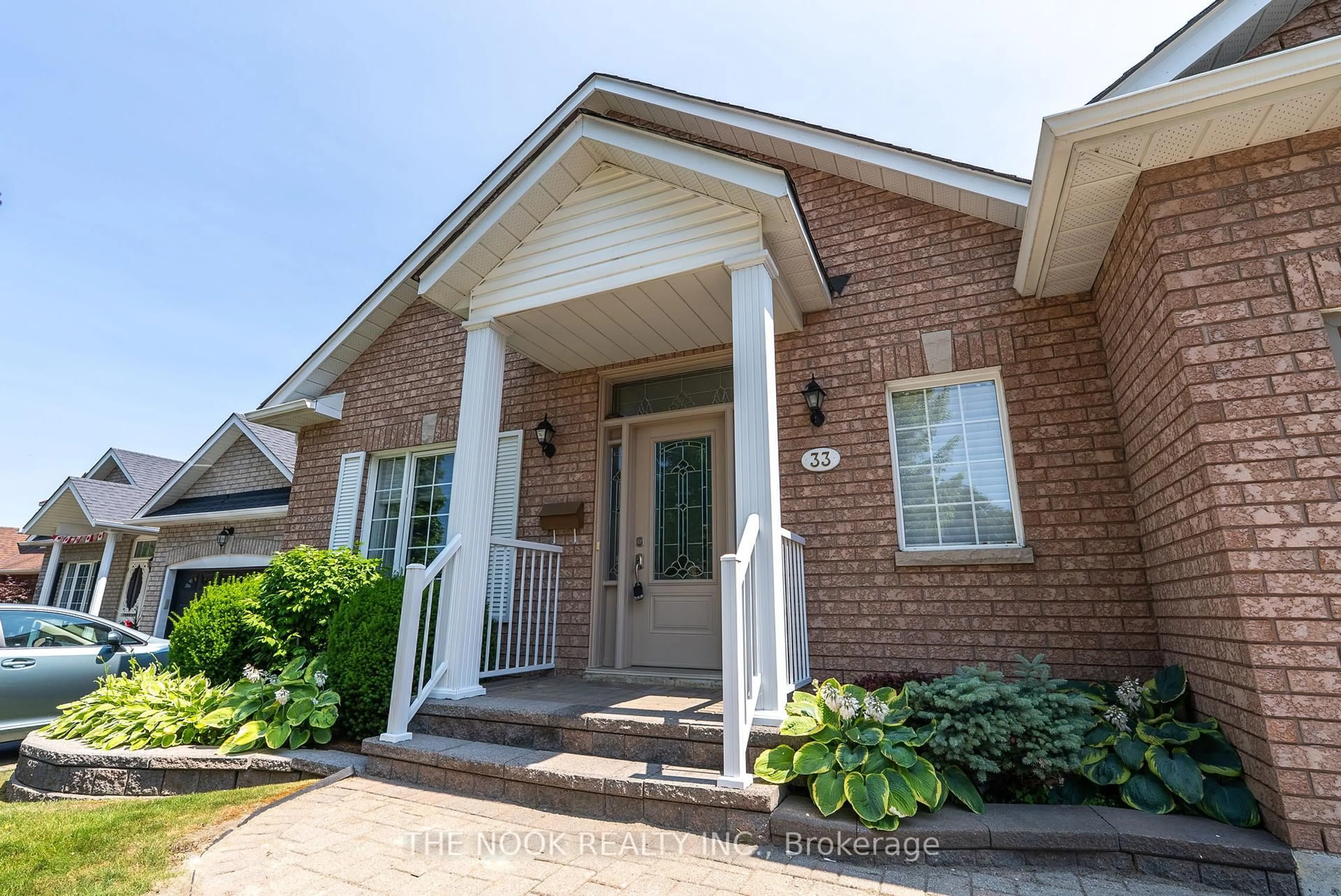 Home with brick exterior material, street for 33 Commons Blvd, Scugog Ontario L9L 1S5