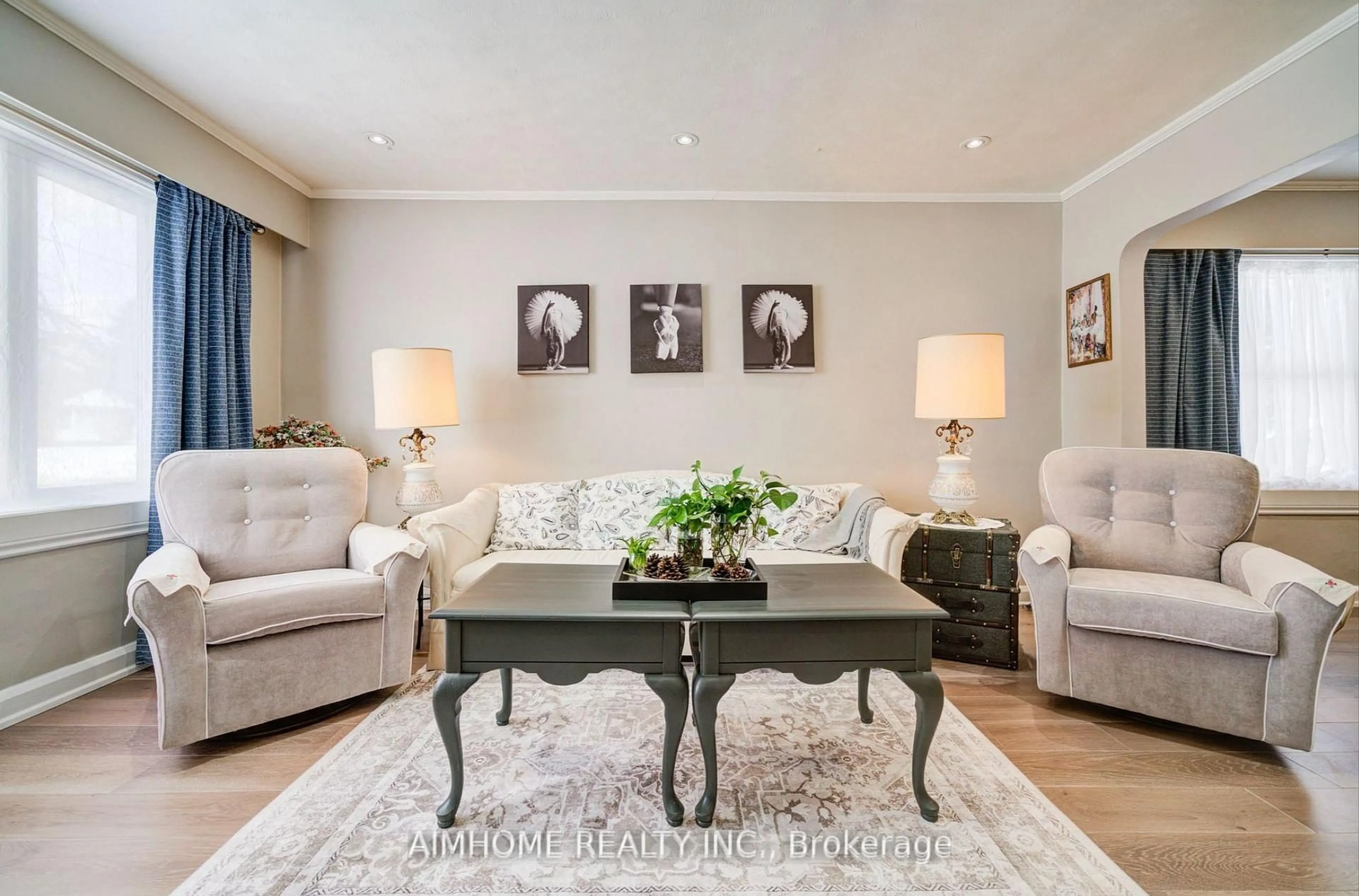 Living room with furniture, wood/laminate floor for 221 St Lawrence St, Whitby Ontario L1N 1G9