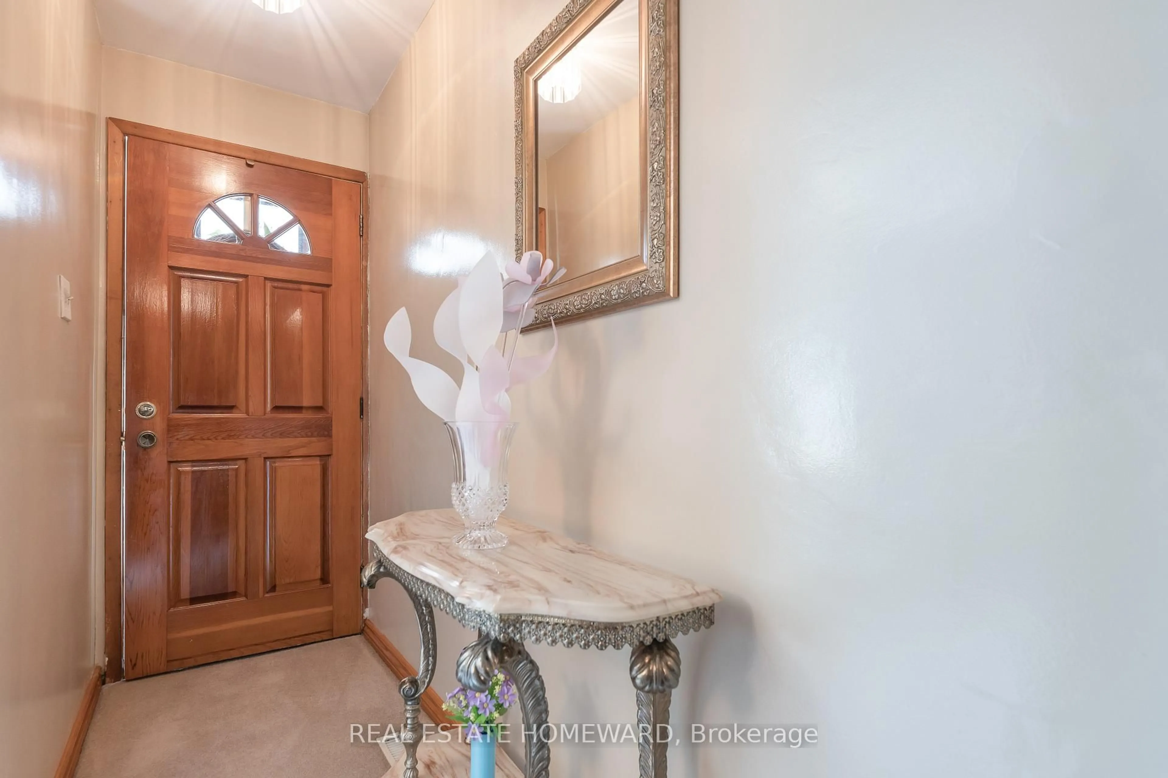 Indoor foyer for 331 Rhodes Ave, Toronto Ontario M4L 3A4