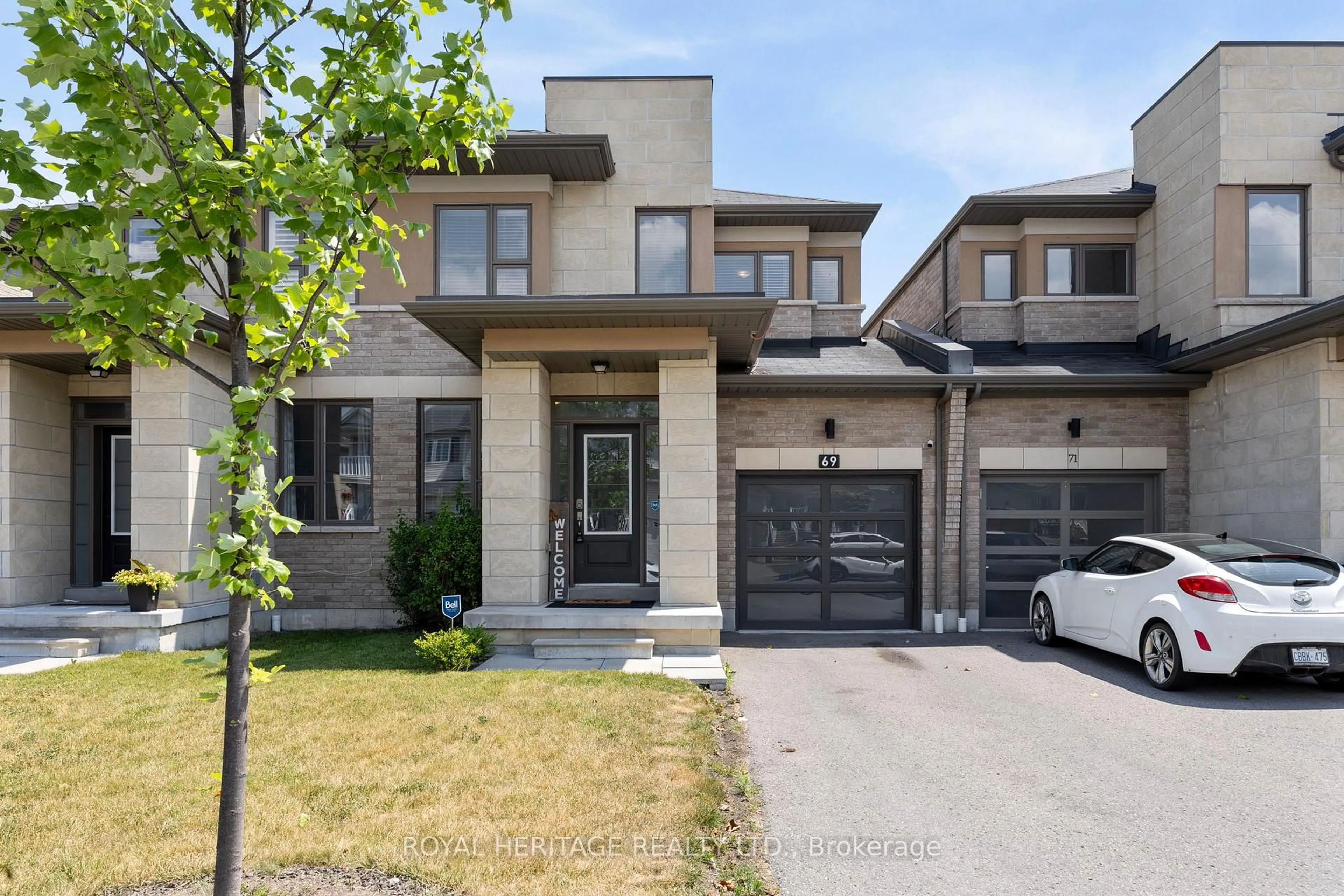 Home with brick exterior material, street for 69 Barrister Ave, Whitby Ontario L1R 0N3