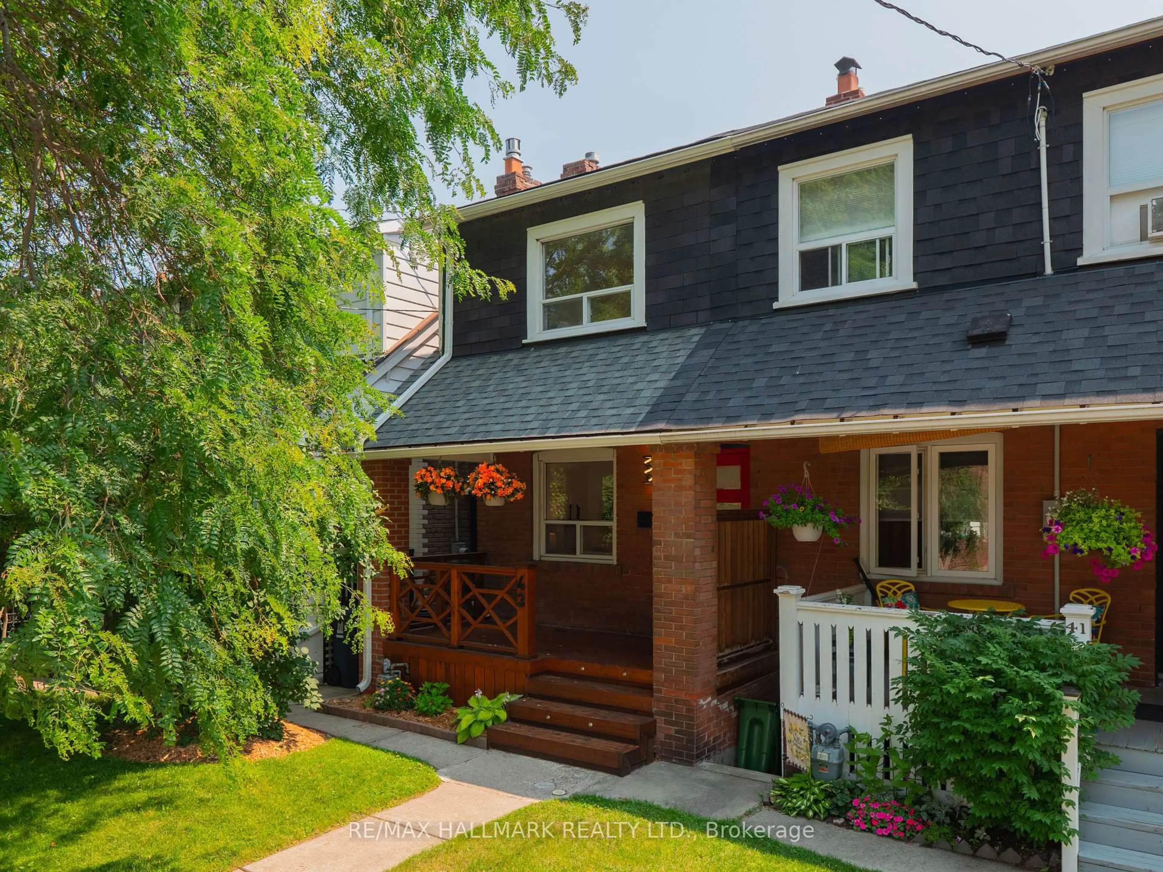 Home with brick exterior material, street for 43 Hannaford St, Toronto Ontario M4E 3G8