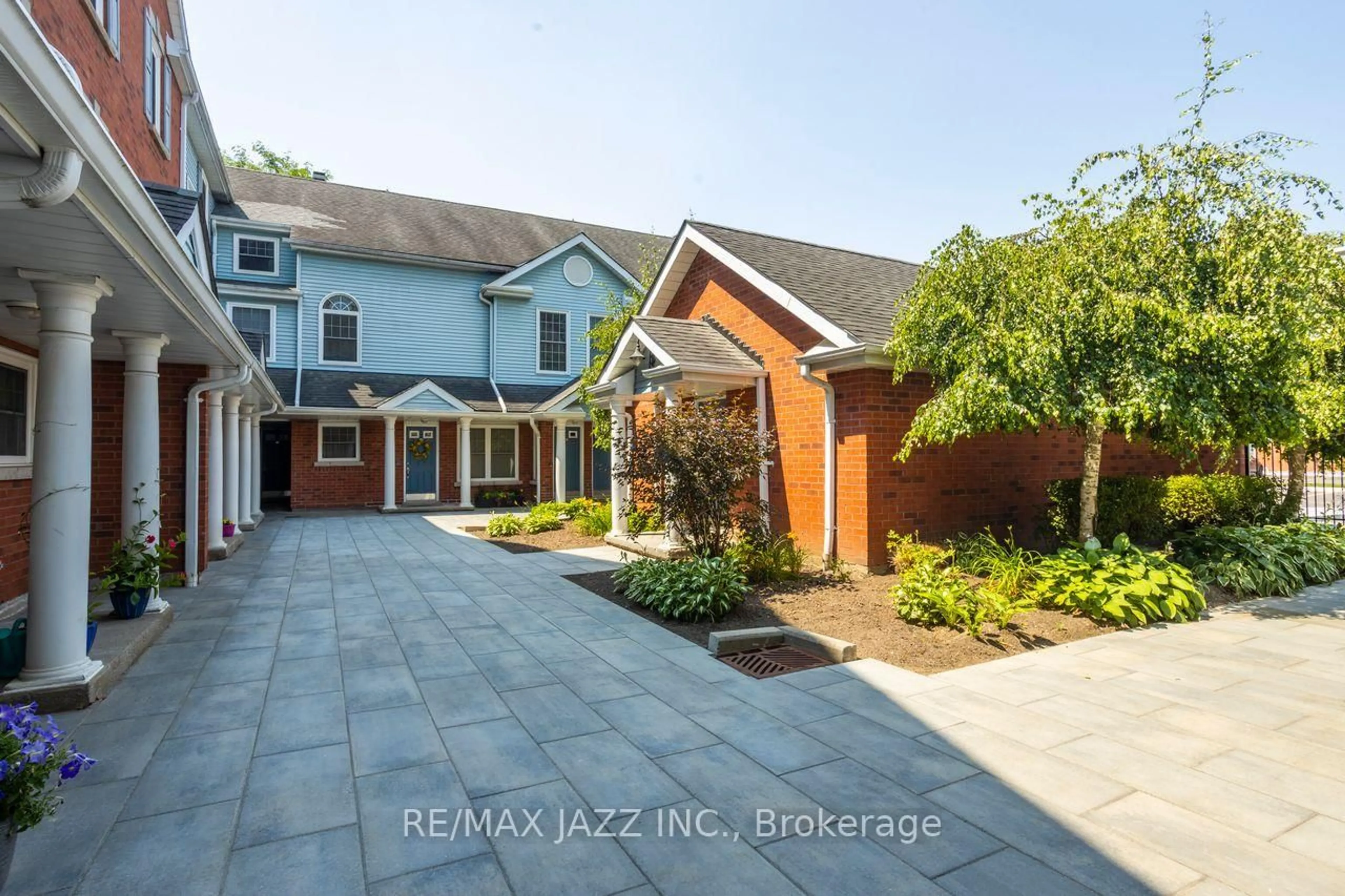 A pic from outside/outdoor area/front of a property/back of a property/a pic from drone, street for 1655 Nash Rd #C2, Clarington Ontario L1E 1S8