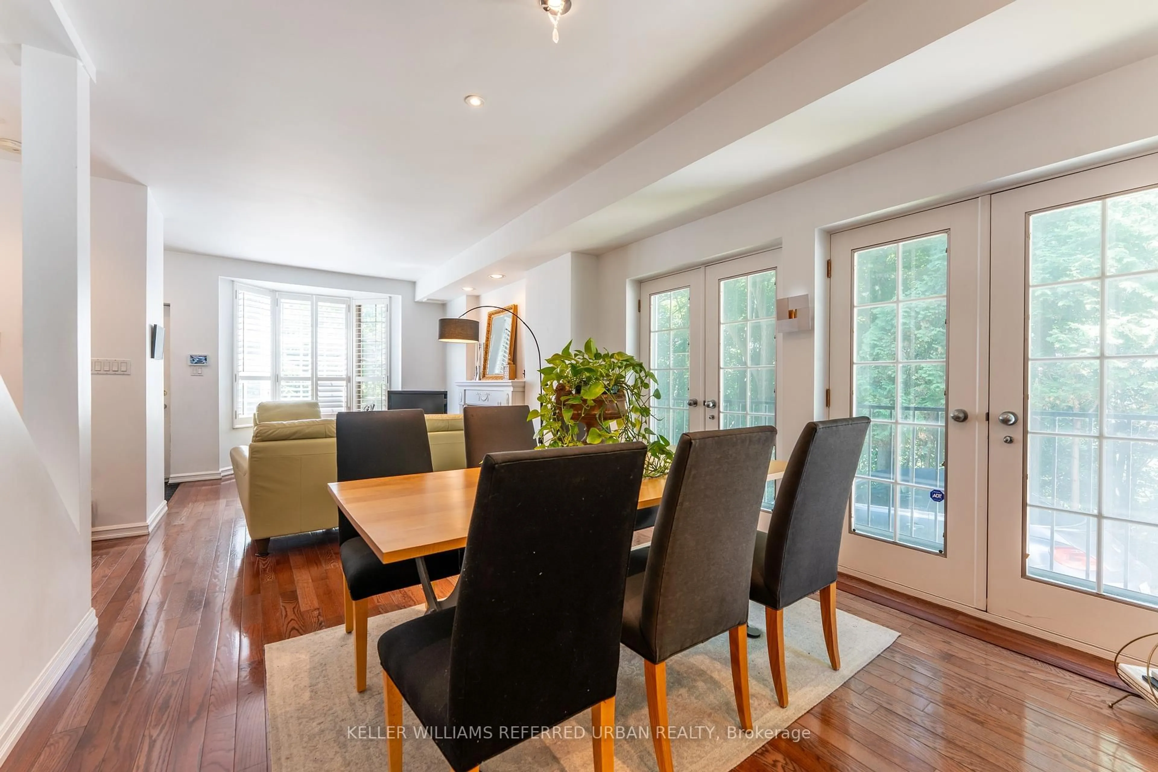Dining room, wood/laminate floor for 18 Eastmount Ave, Toronto Ontario M4K 1V1