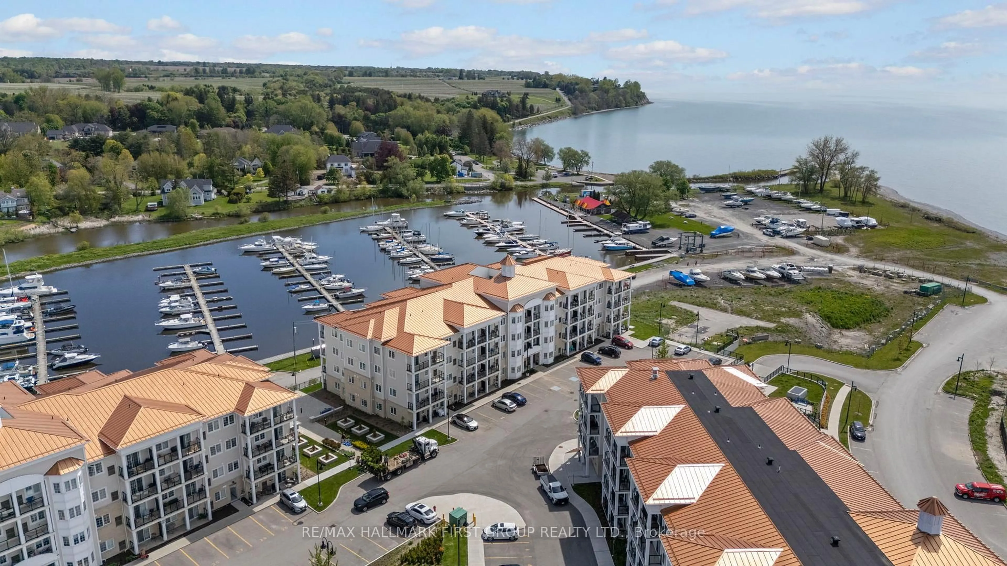 A pic from outside/outdoor area/front of a property/back of a property/a pic from drone, water/lake/river/ocean view for 70 Shipway Ave #201, Clarington Ontario L1B 0V7