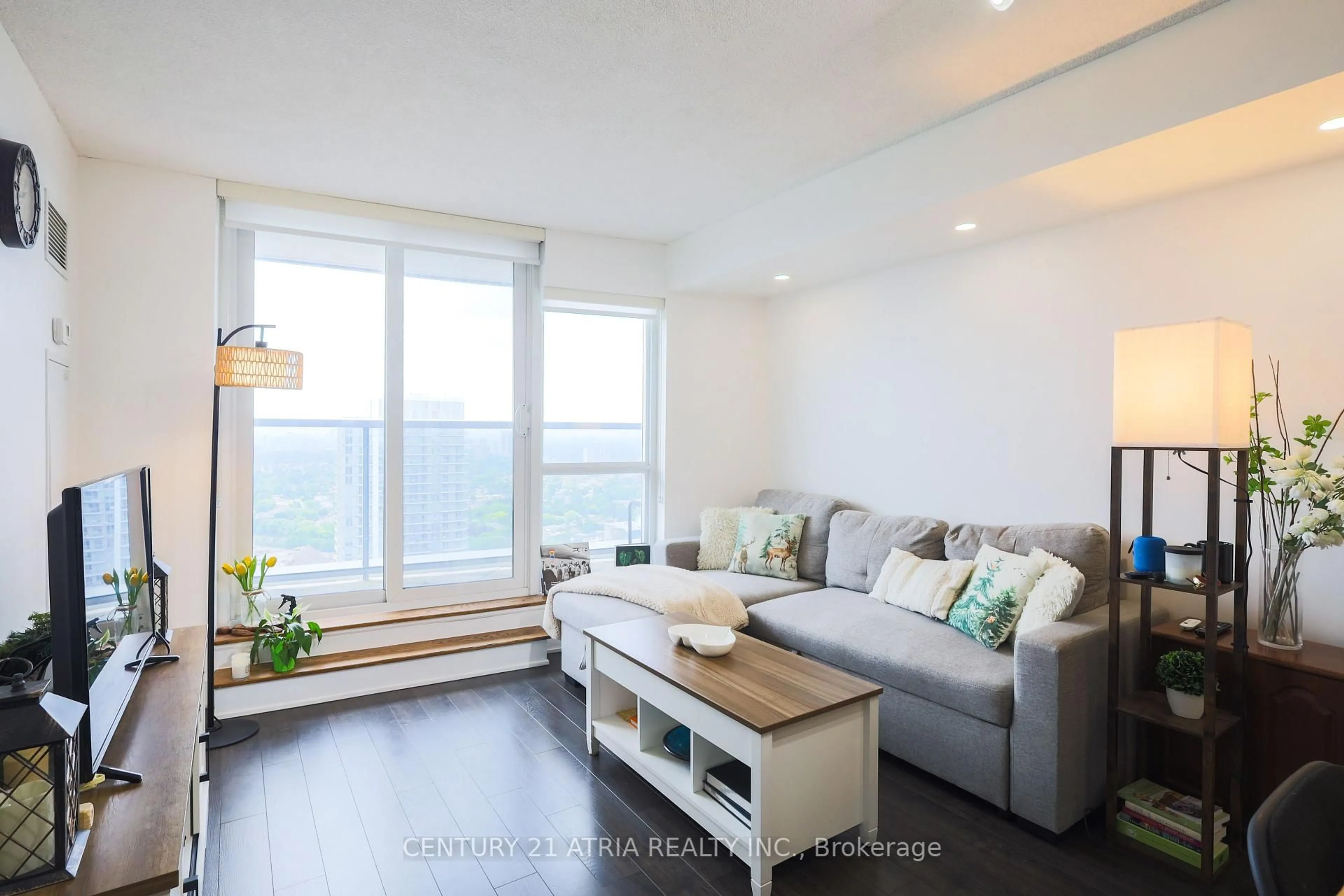 Living room with furniture, wood/laminate floor for 125 Village Green Sq #3707, Toronto Ontario M1S 0G3