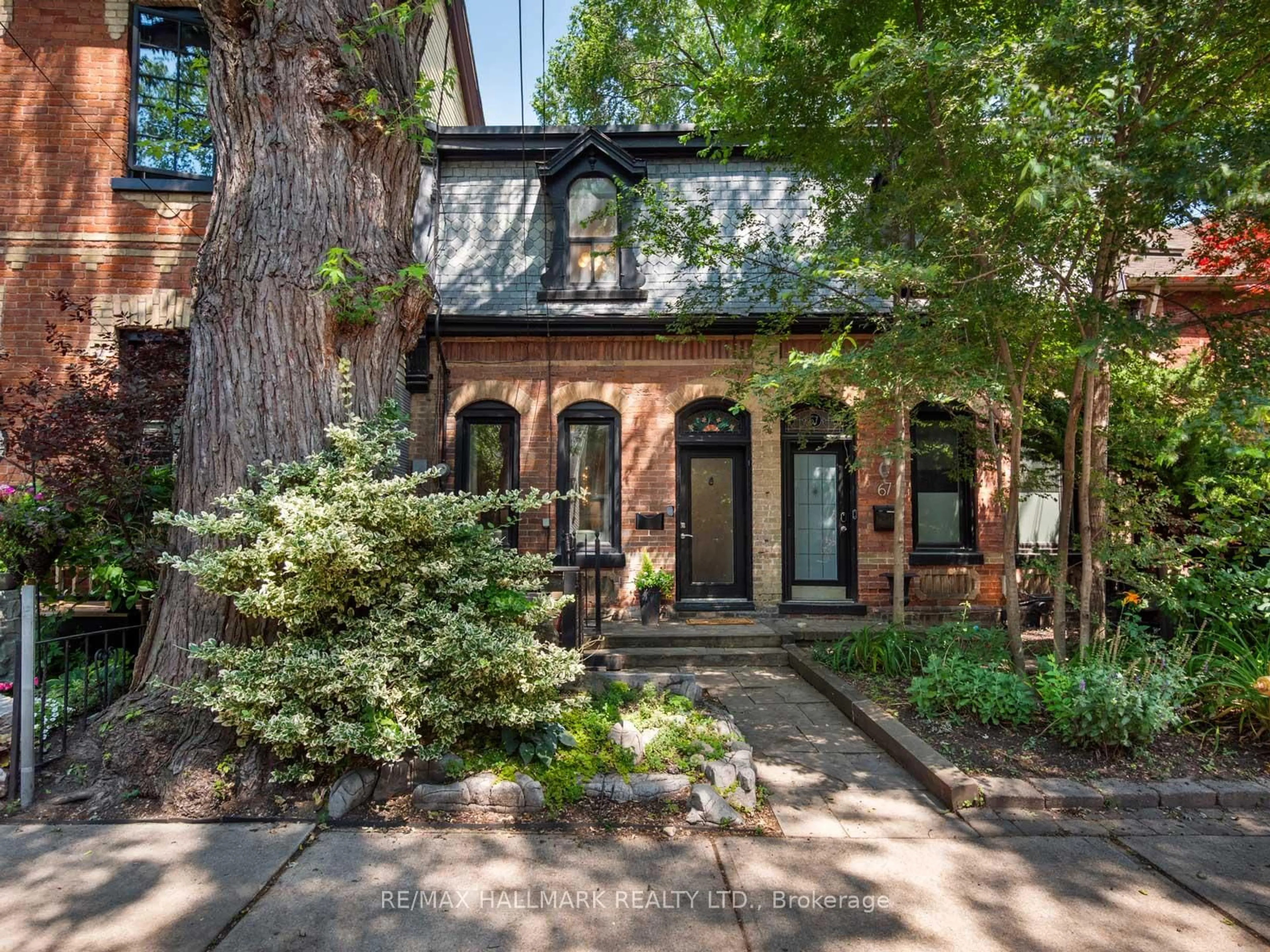 Home with brick exterior material, street for 69 De Grassi St, Toronto Ontario M4M 2K5