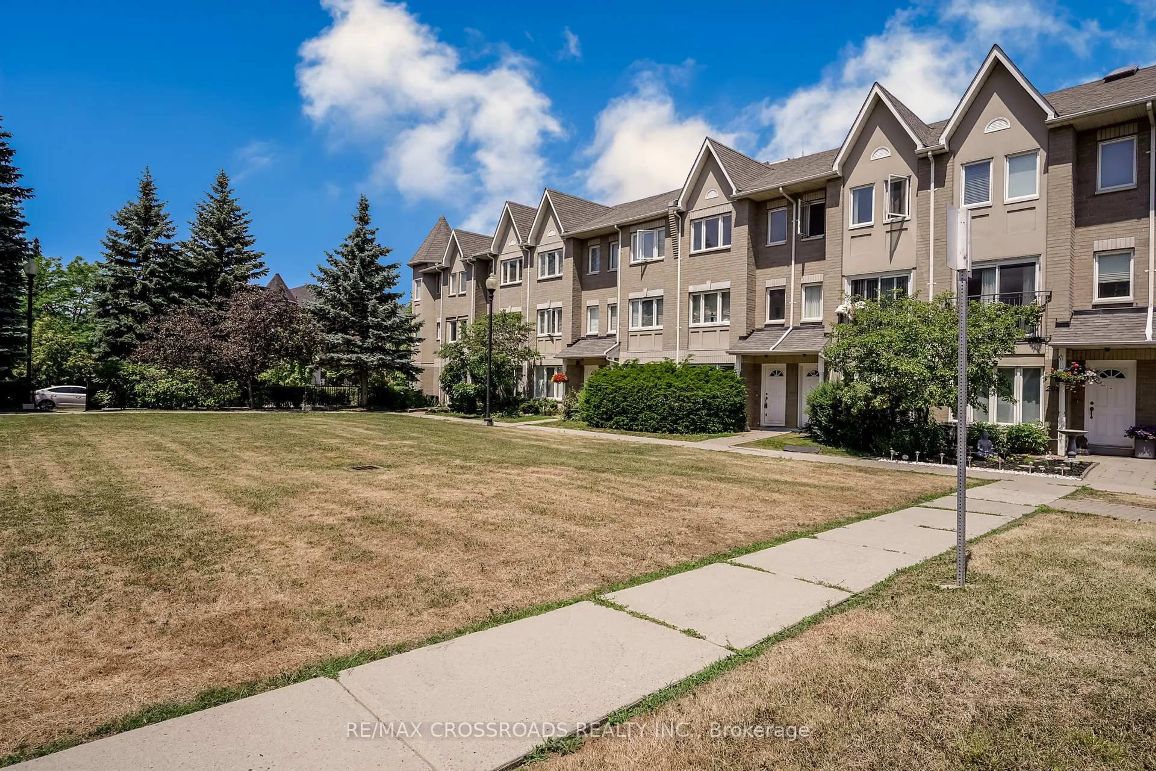 A pic from outside/outdoor area/front of a property/back of a property/a pic from drone, street for 29 Rosebank Dr #206, Toronto Ontario M1B 5Y7