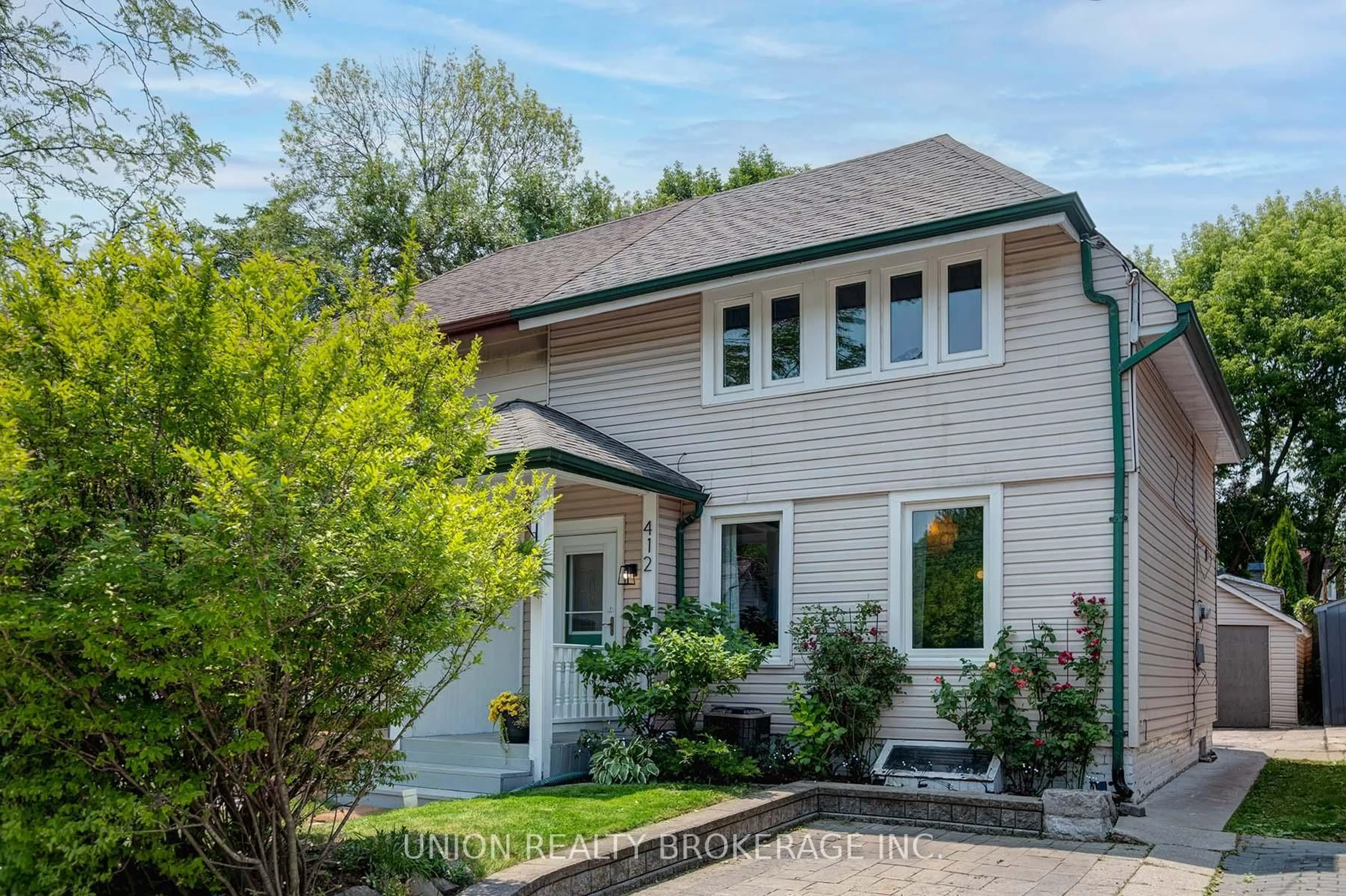 Home with brick exterior material, street for 412 Coxwell Ave, Toronto Ontario M4L 3B7
