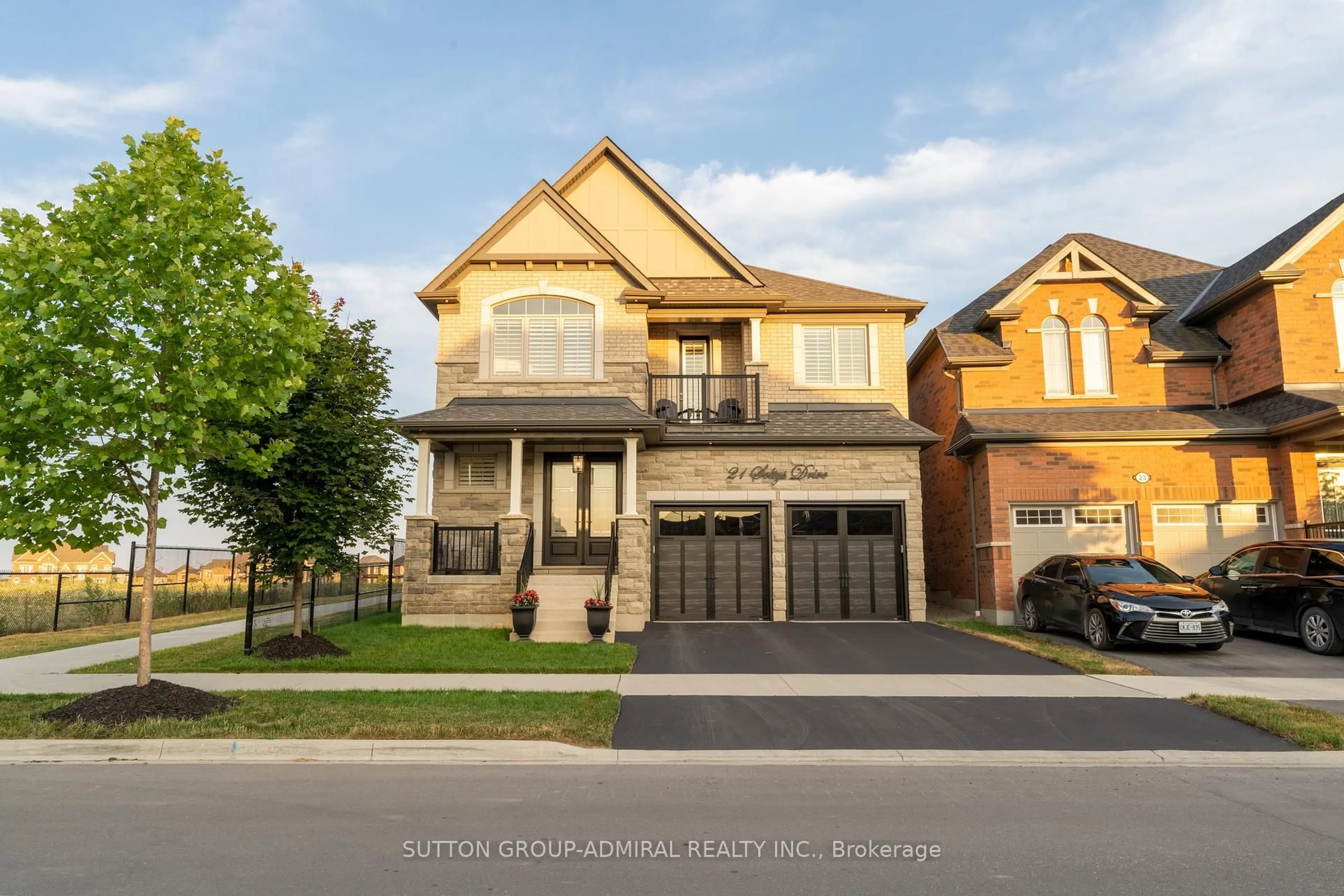 Home with brick exterior material, street for 21 Soltys Dr, Whitby Ontario L1P 0J3