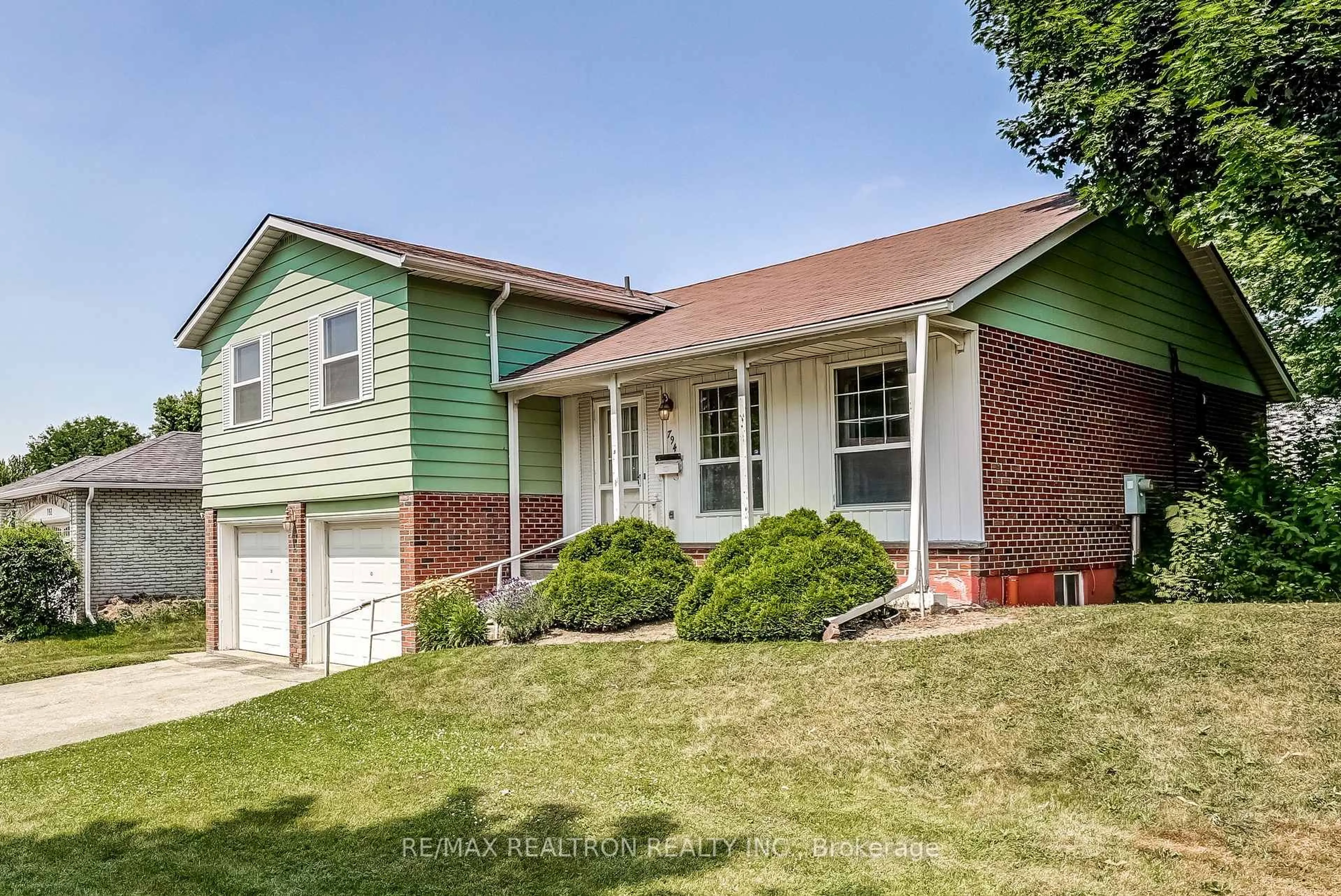 Home with brick exterior material, street for 794 Huntingwood Dr, Toronto Ontario M1T 2L6