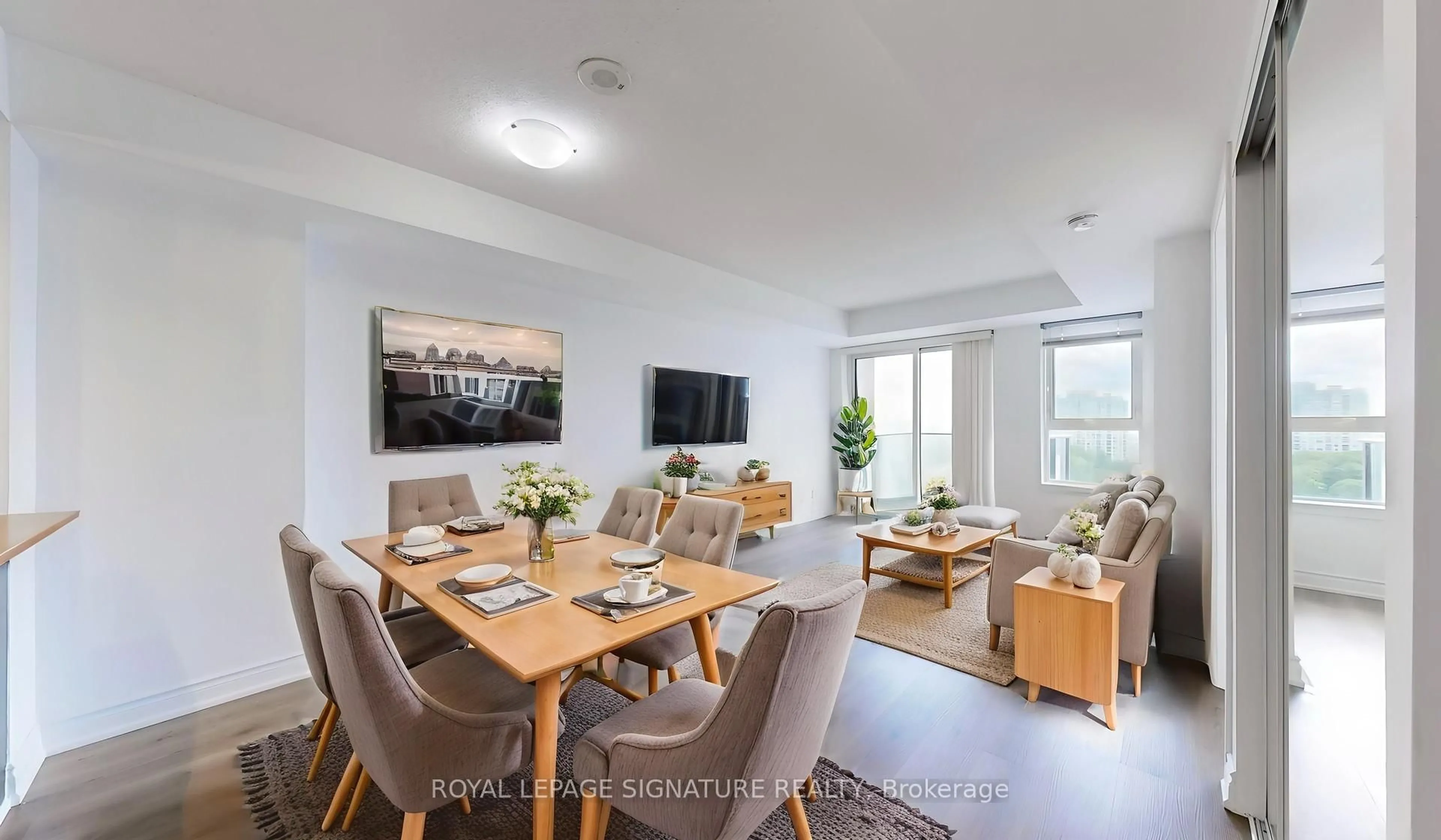 Living room with furniture, wood/laminate floor for 190 Borough Dr #1909, Toronto Ontario M1P 0B6