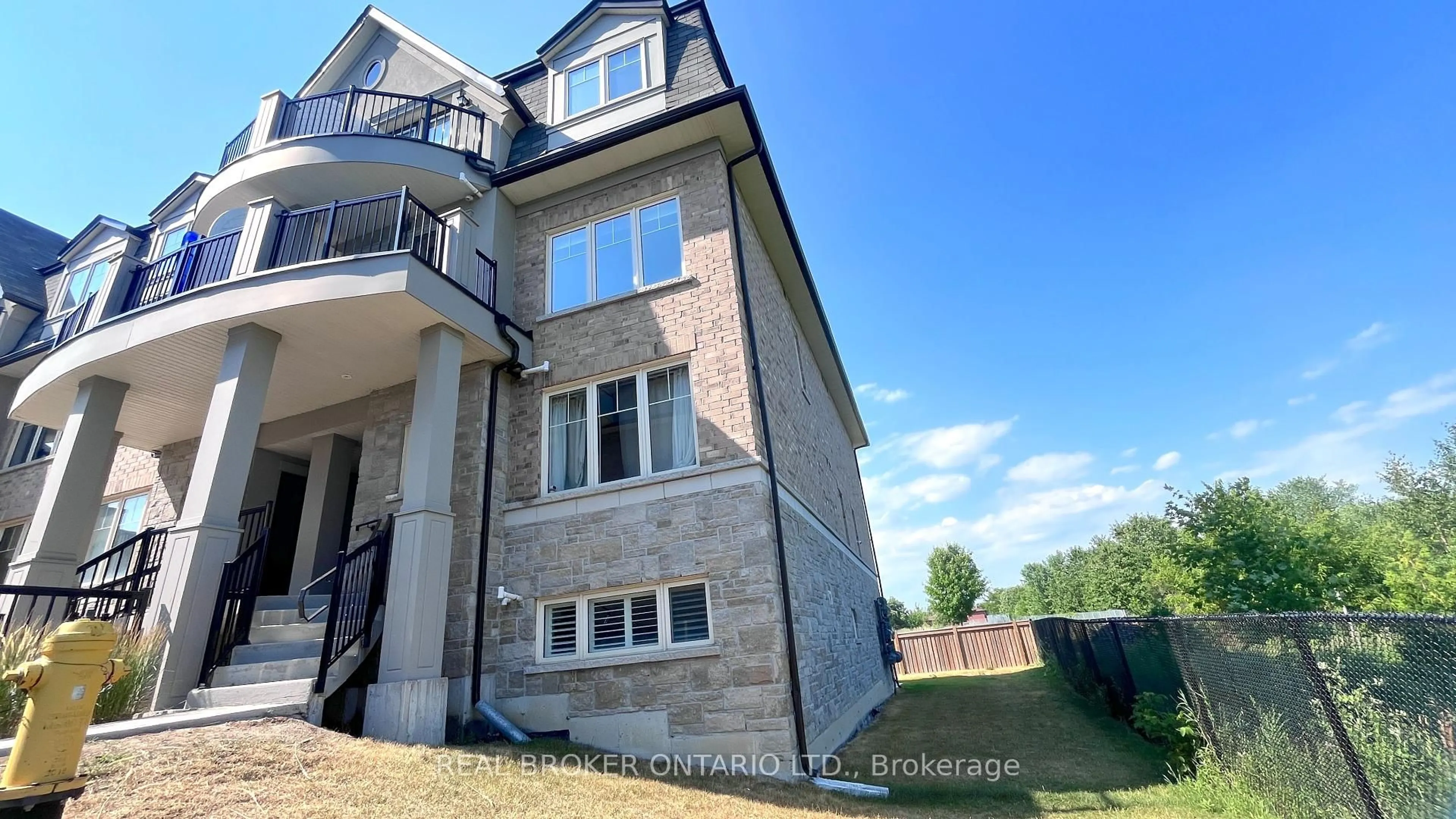 Home with brick exterior material, building for 13 EATON PARK Lane #29, Toronto Ontario M1W 0A5