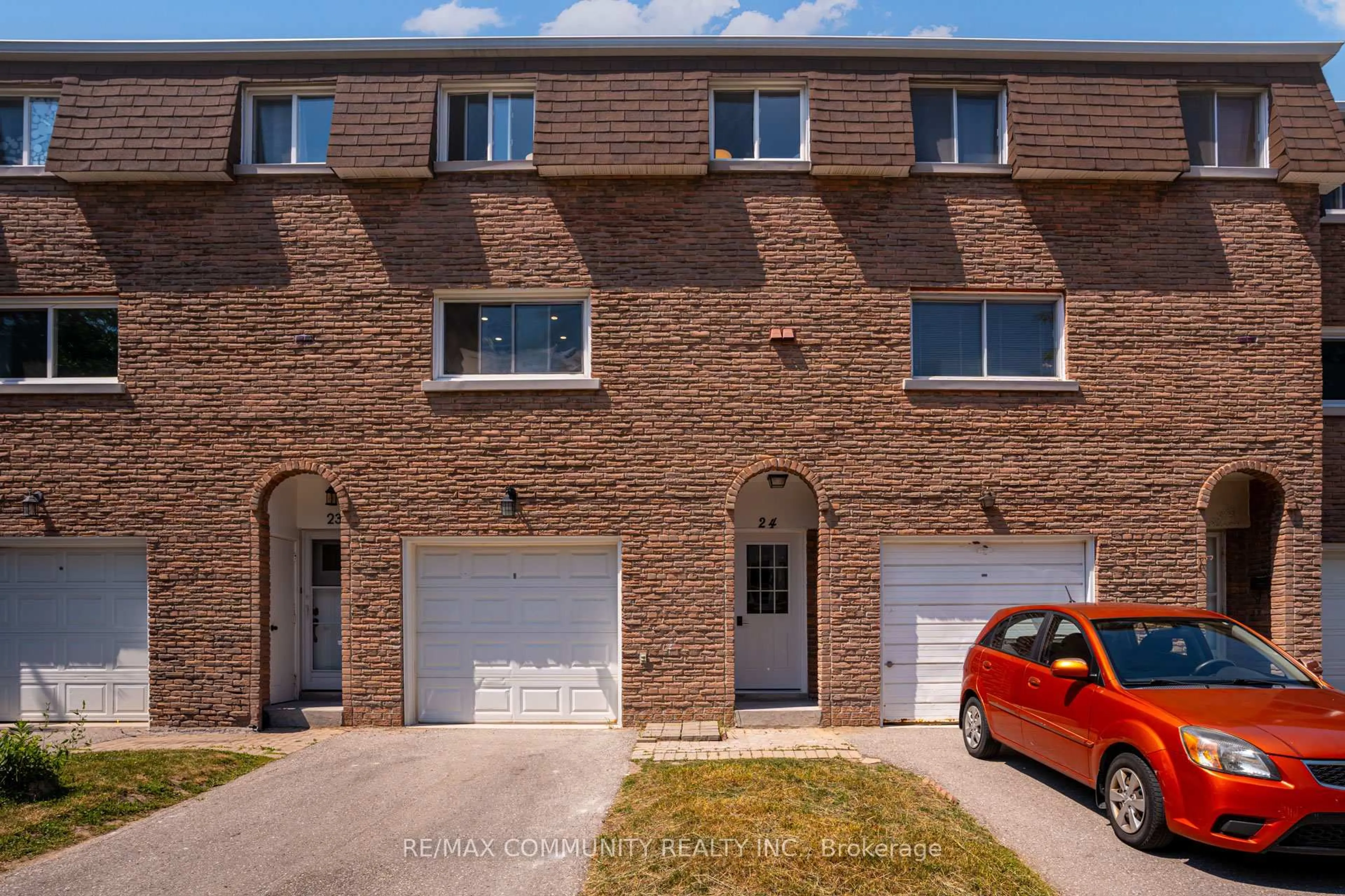 Home with brick exterior material, street for 121 Centennial Rd #24, Toronto Ontario M1C 2A8