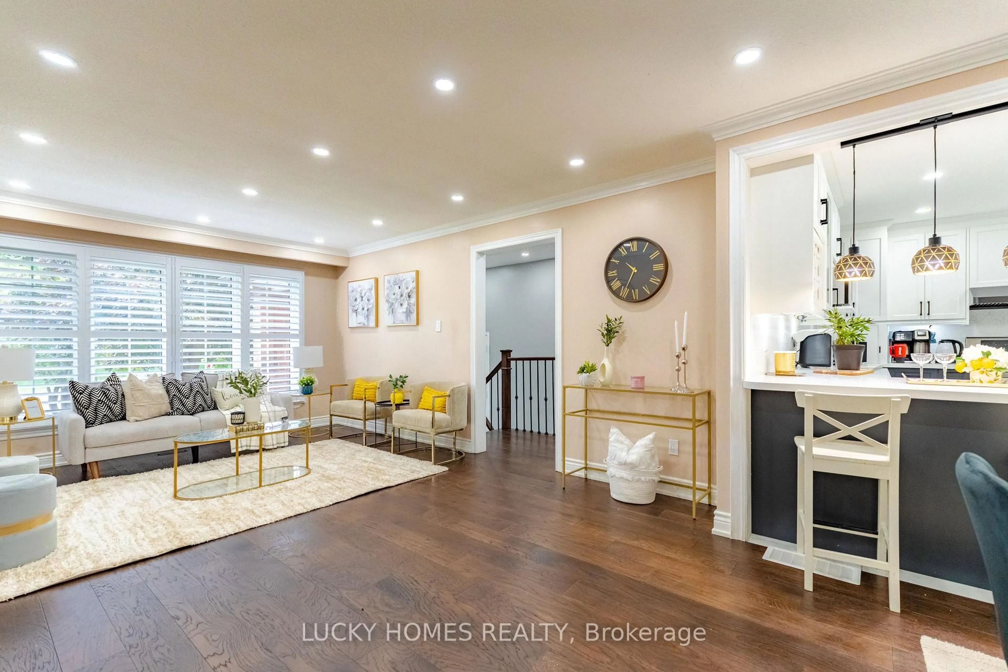Living room with furniture, wood/laminate floor for 4396 Lawrence Ave, Toronto Ontario M1E 2T5