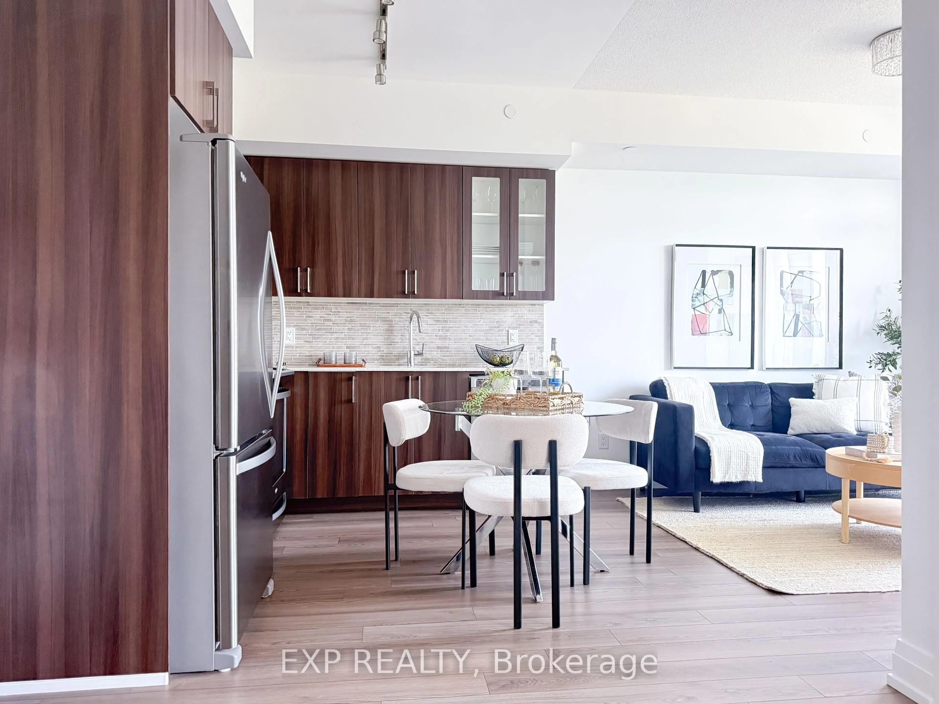 Open concept kitchen, wood/laminate floor for 3121 Sheppard Ave #616, Toronto Ontario M1T 0B6