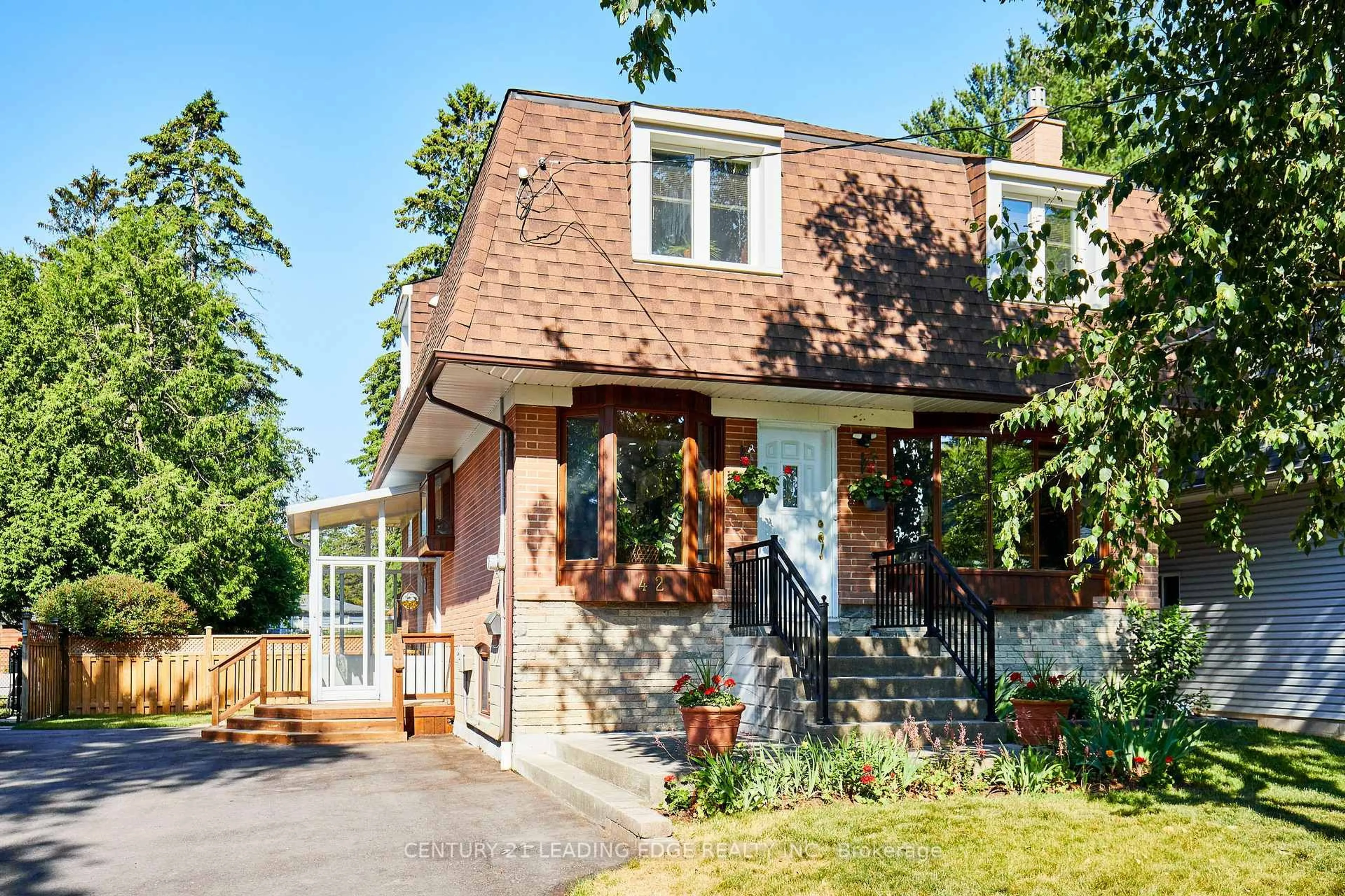 Home with brick exterior material, street for 42 Gladys Rd, Toronto Ontario M1C 1C6