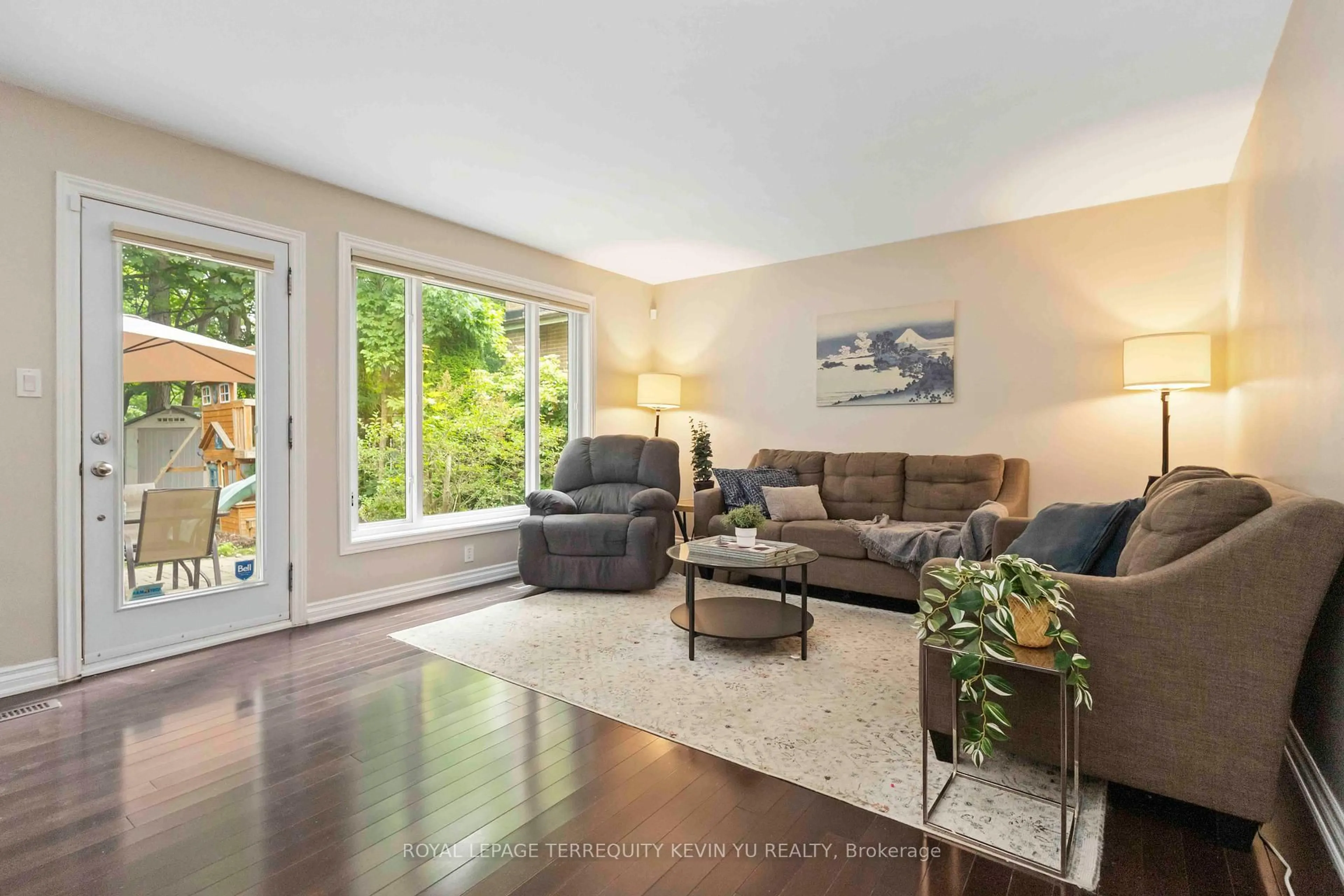 Living room with furniture, wood/laminate floor for 34 Janellan Terr, Toronto Ontario M1E 3M9