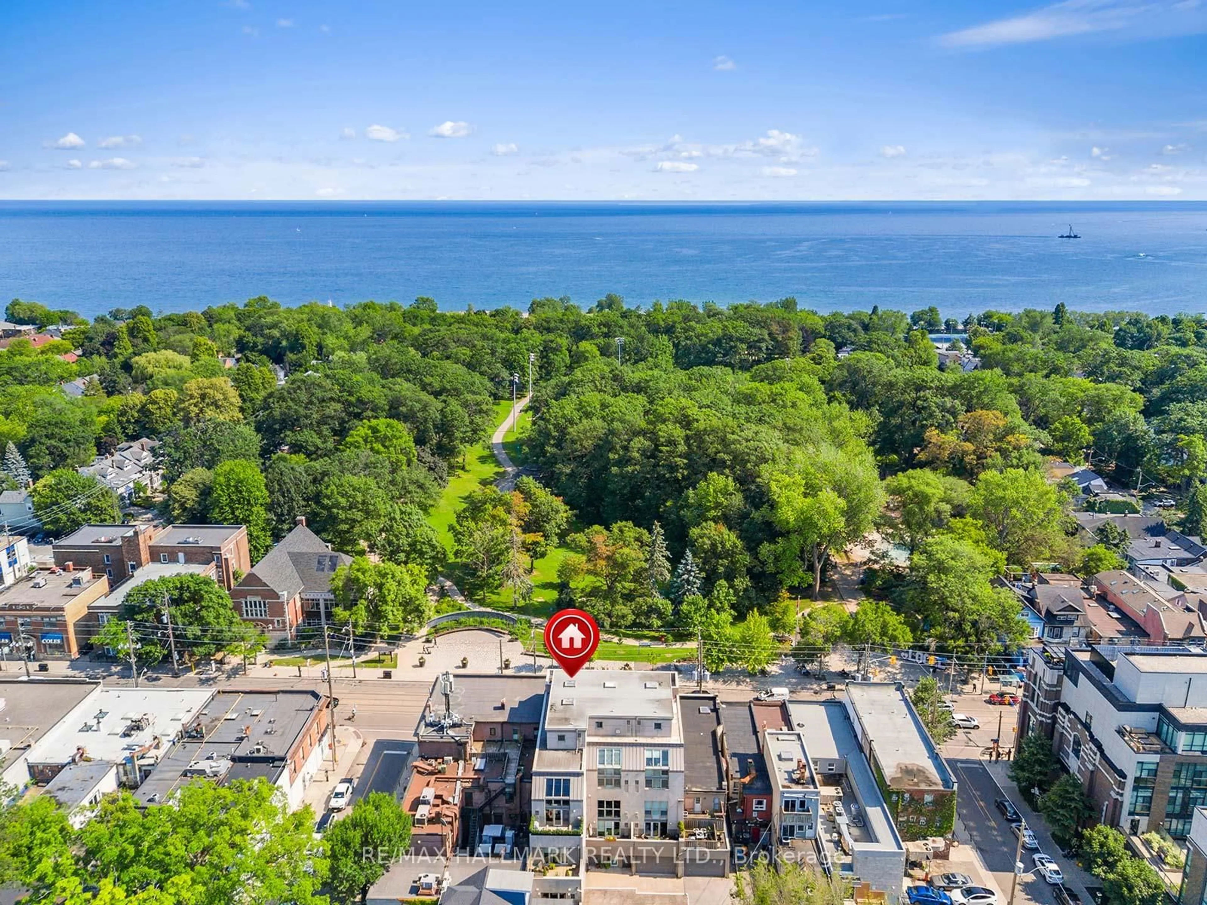 A pic from outside/outdoor area/front of a property/back of a property/a pic from drone, water/lake/river/ocean view for 2012 Queen St #306, Toronto Ontario M4L 1J3