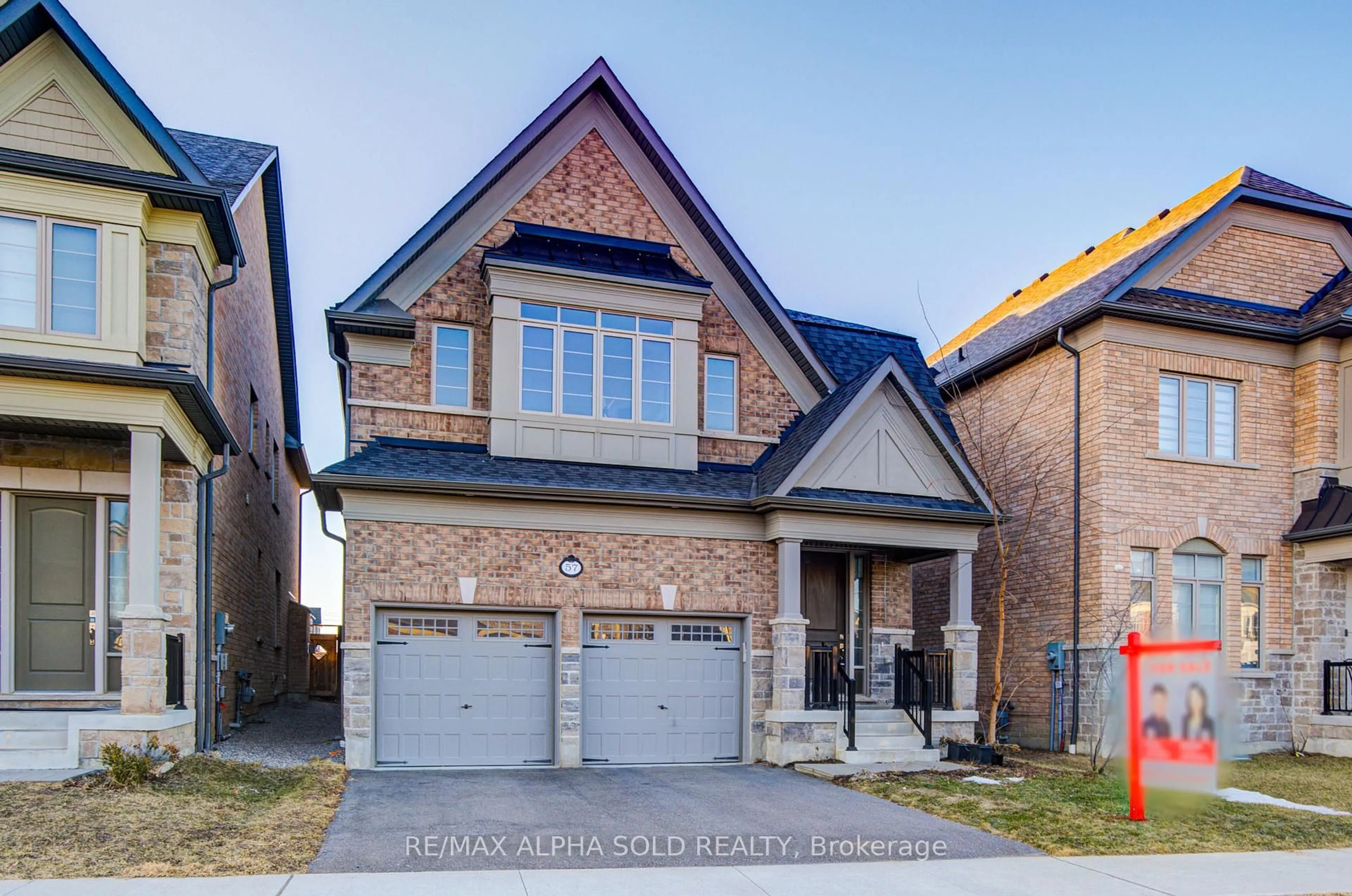 Home with brick exterior material, street for 57 Christine Elliot Ave, Whitby Ontario L1P 0C8