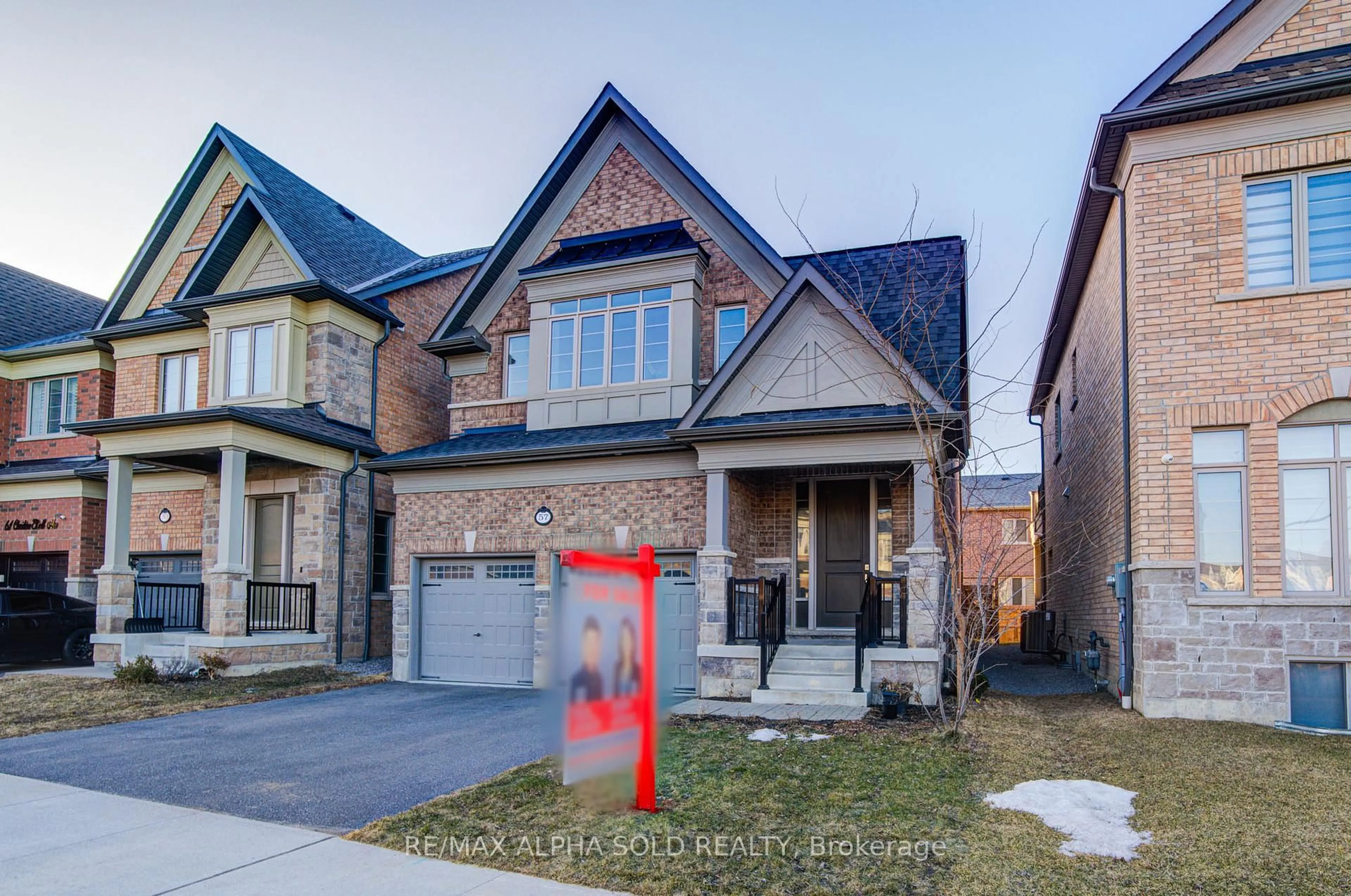 Home with brick exterior material, street for 57 Christine Elliot Ave, Whitby Ontario L1P 0C8