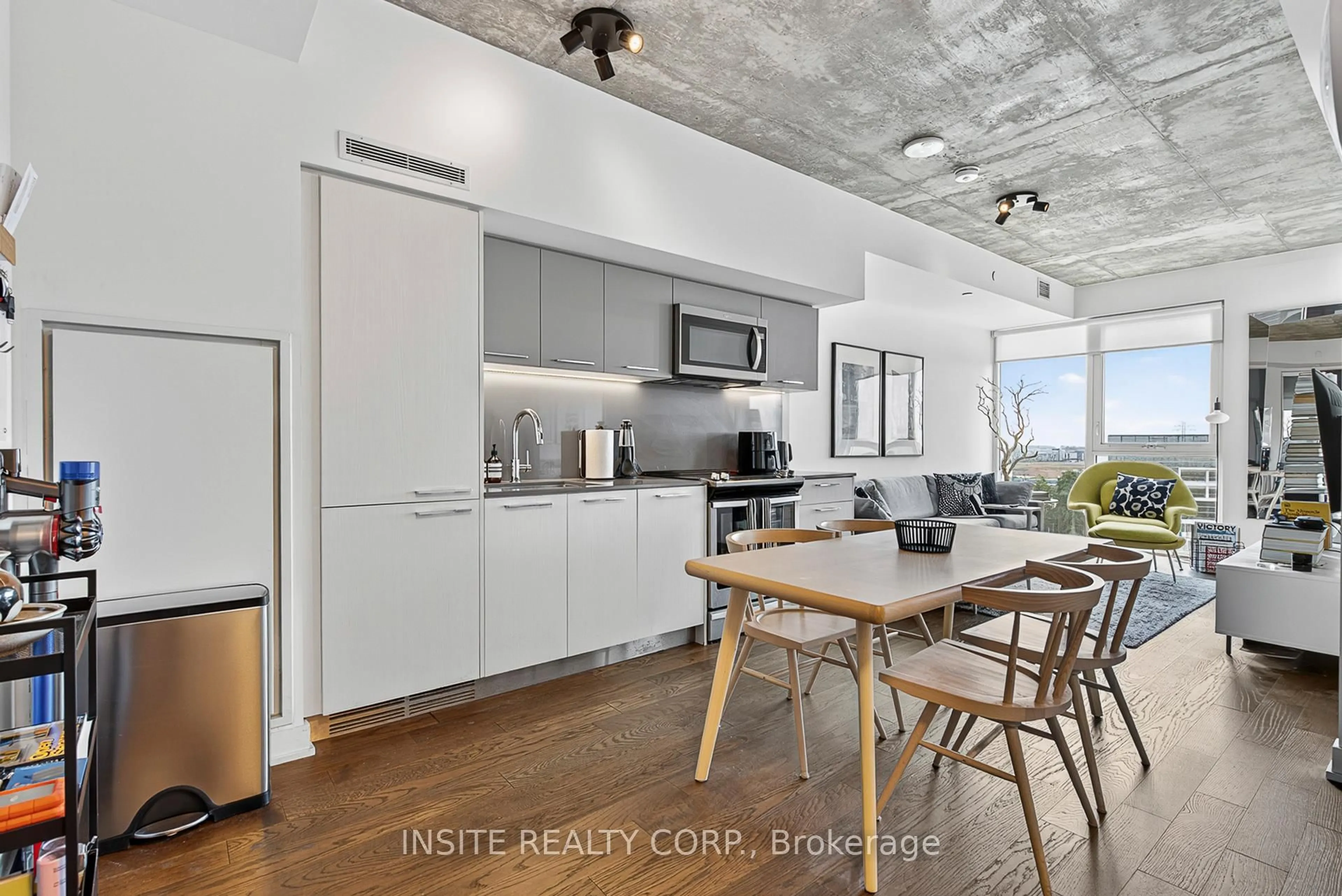 Open concept kitchen, cement floor for 15 Baseball Pl #806, Toronto Ontario M4M 0E6