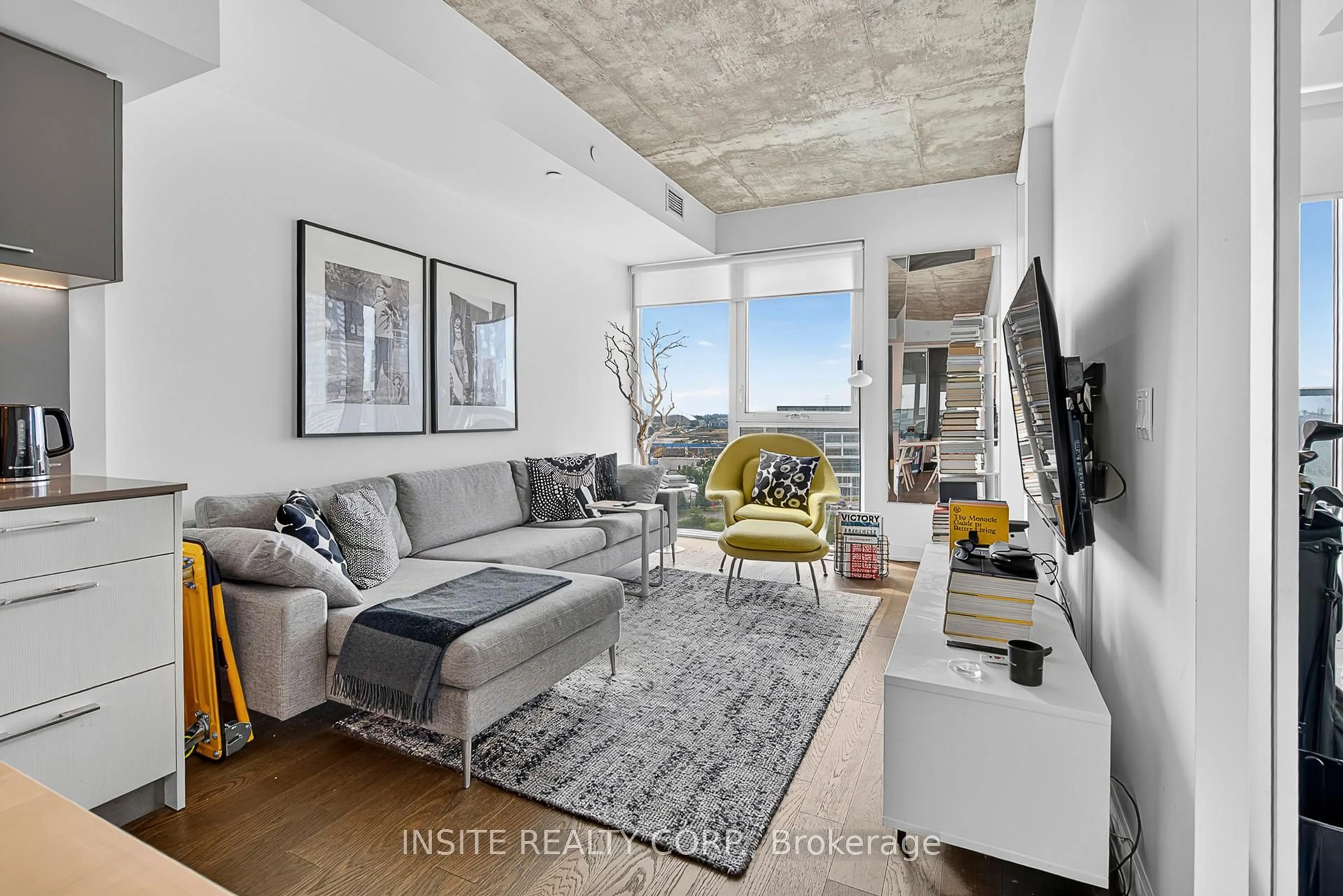 Living room with furniture, unknown for 15 Baseball Pl #806, Toronto Ontario M4M 0E6