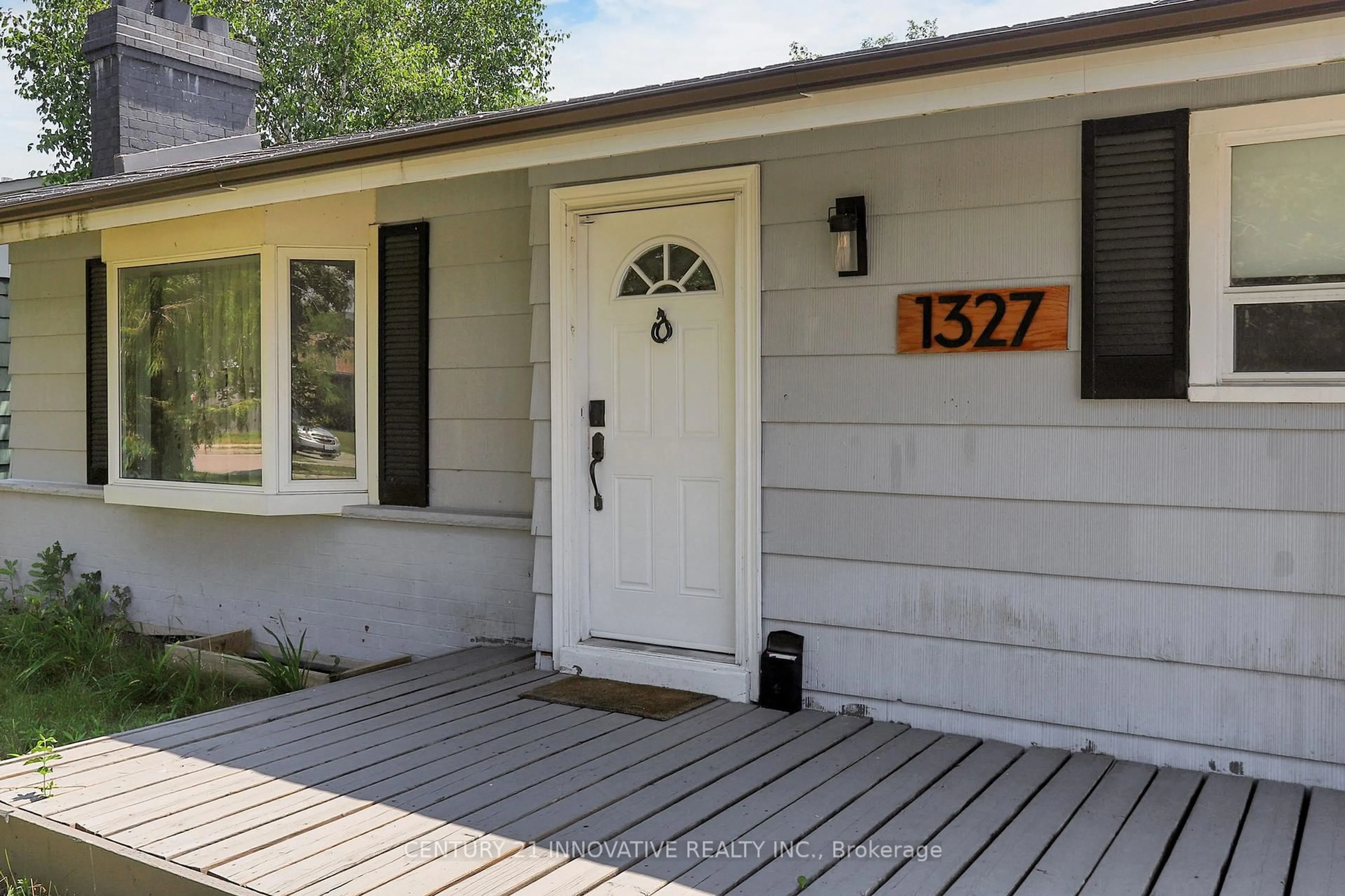 Home with vinyl exterior material, street for 1327 Commerce St, Pickering Ontario L1W 1E1