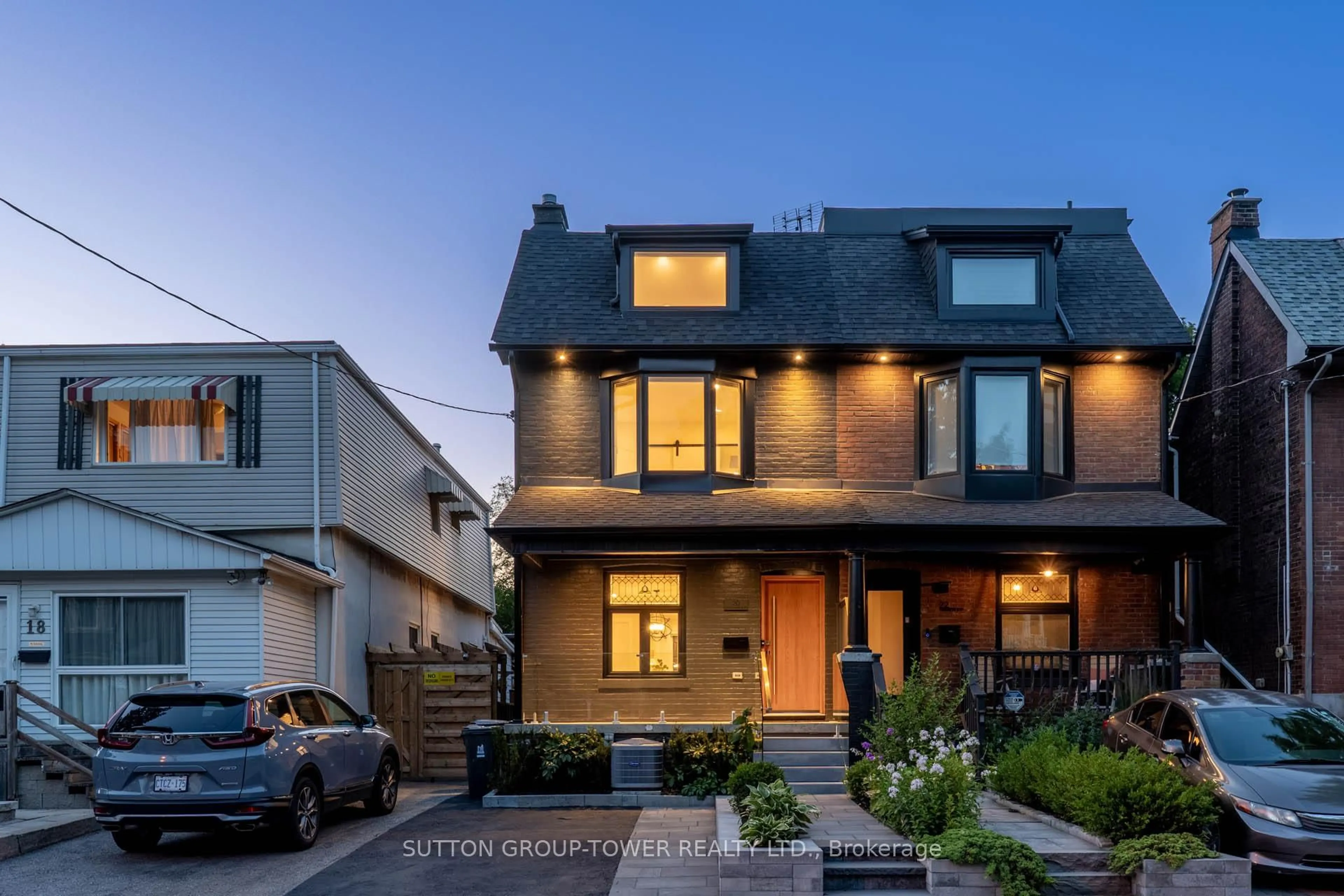 Home with brick exterior material, street for 20 Strathmore Blvd, Toronto Ontario M4J 1P2