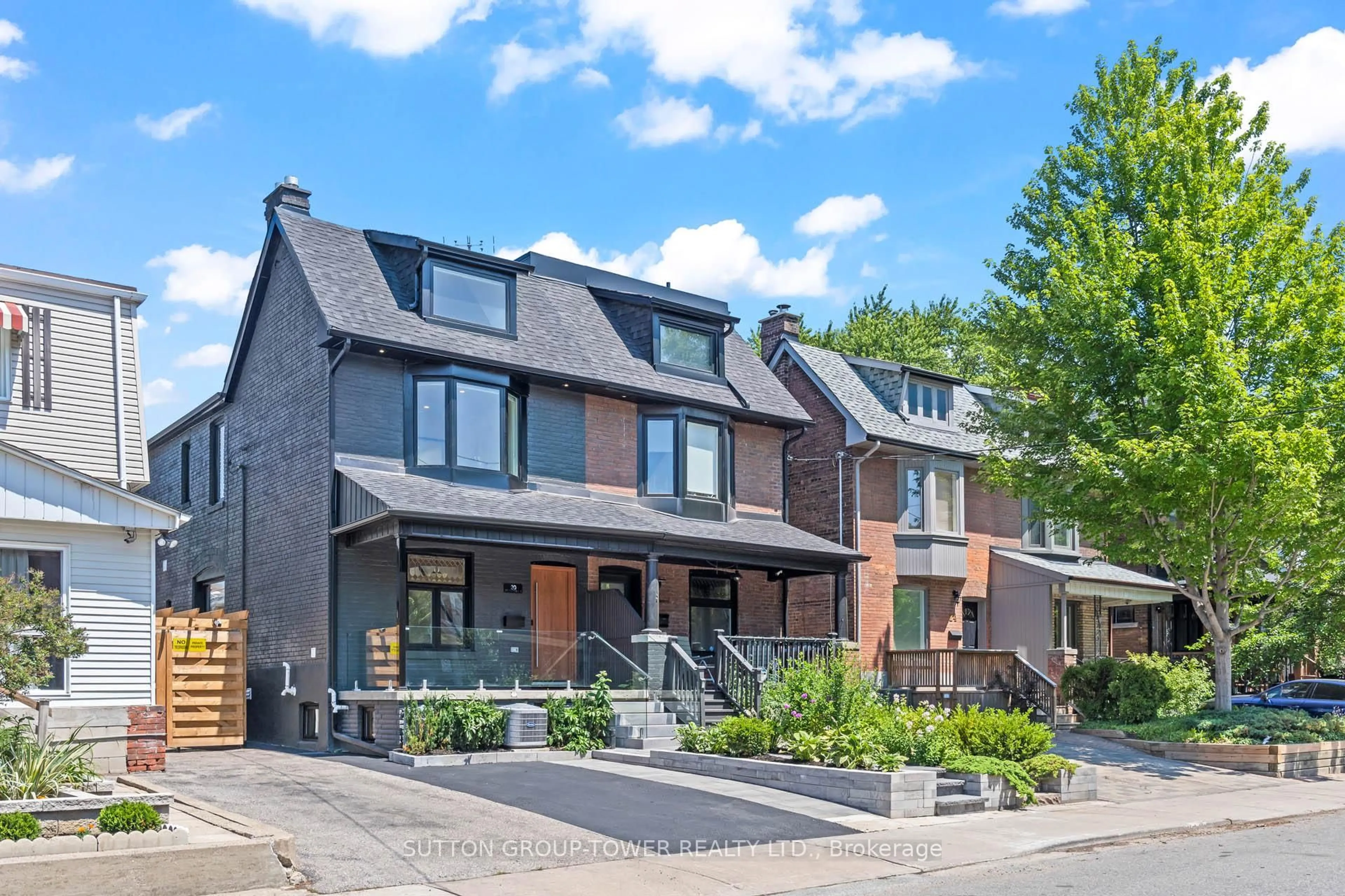 Home with brick exterior material, street for 20 Strathmore Blvd, Toronto Ontario M4J 1P2