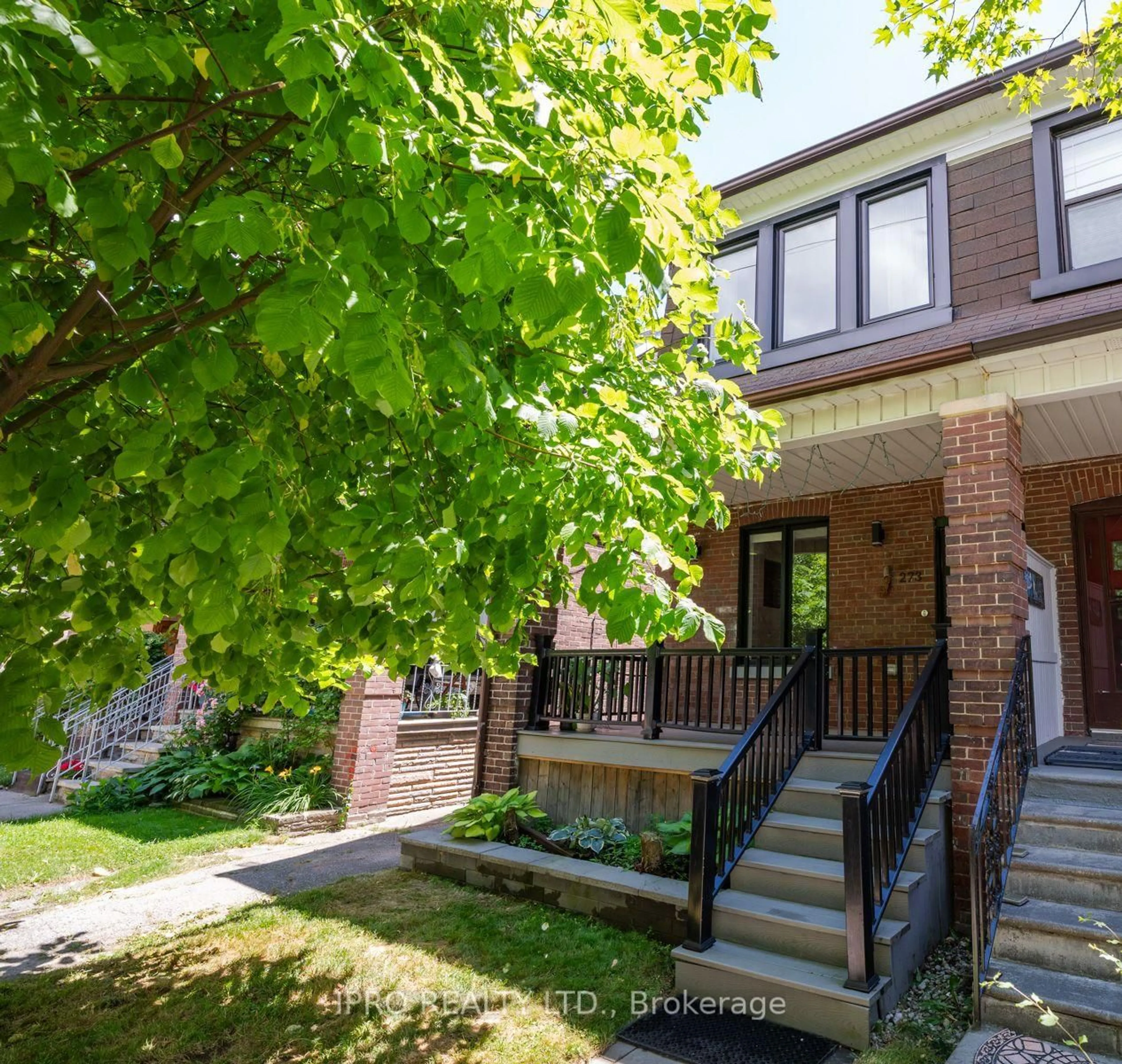 Home with brick exterior material, street for 273 Strathmore Blvd, Toronto Ontario M4J 1P7