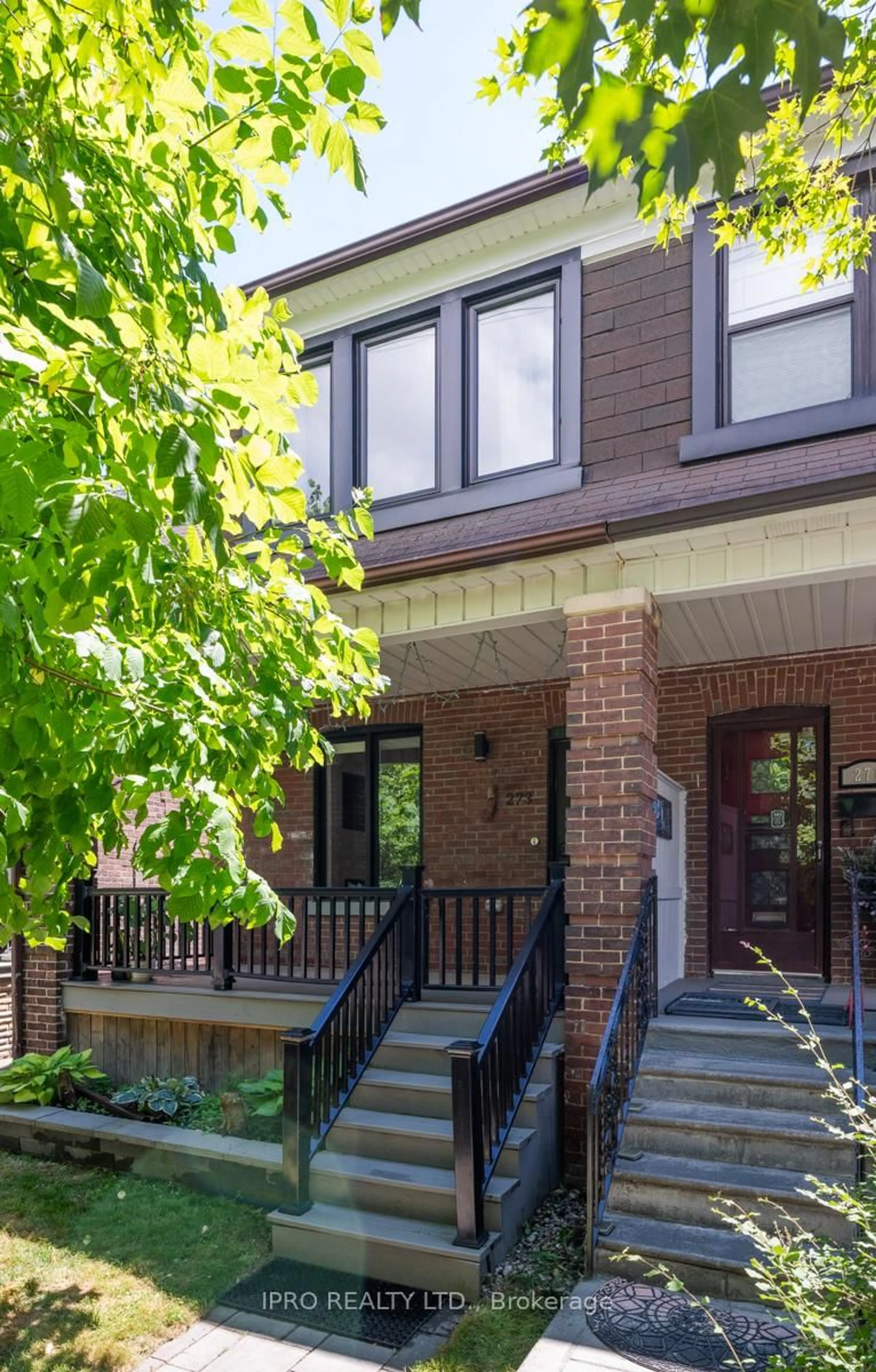 Home with brick exterior material, street for 273 Strathmore Blvd, Toronto Ontario M4J 1P7
