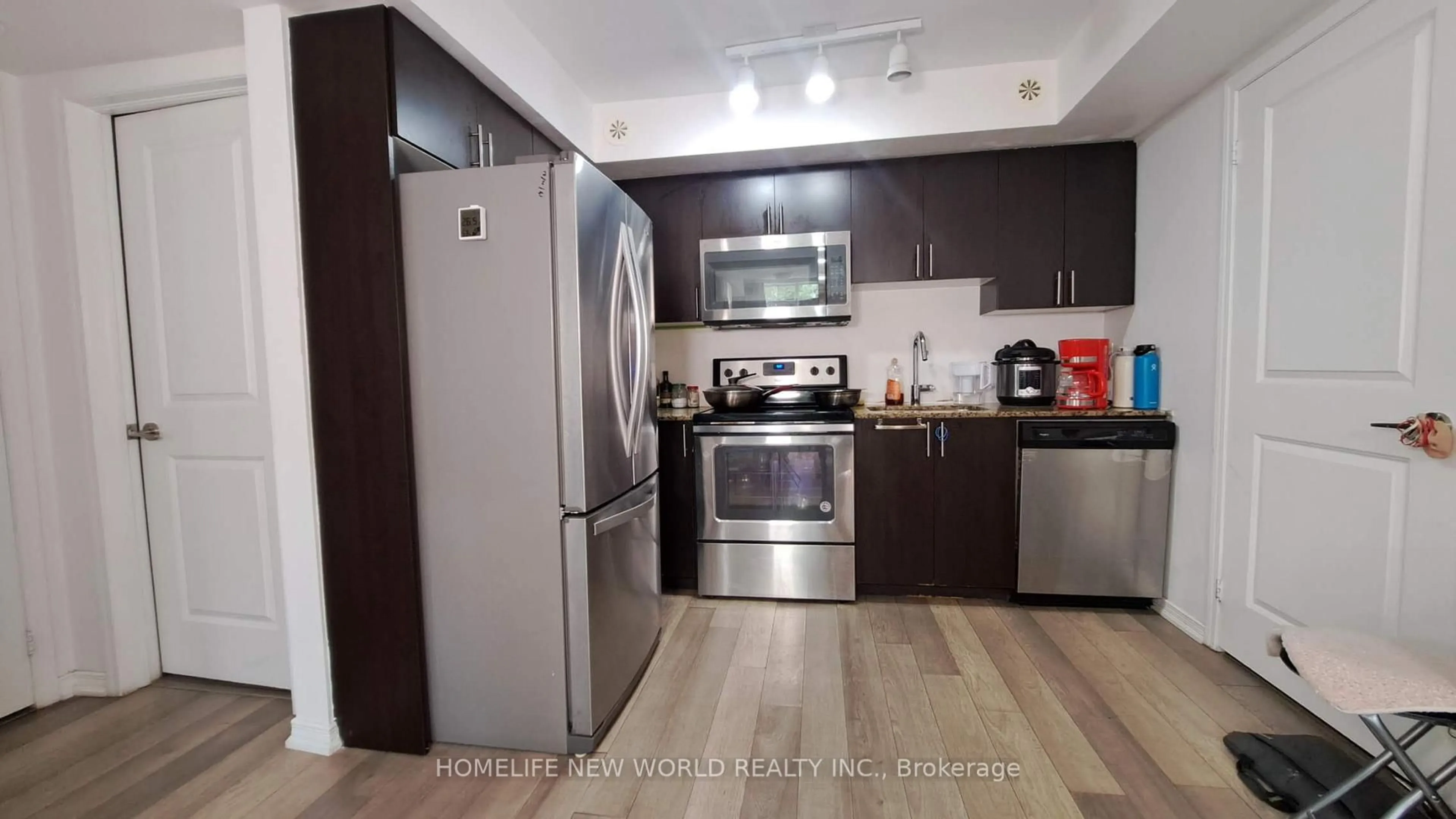 Standard kitchen, wood/laminate floor for 1070 progress Ave, Toronto Ontario M1B 0C5