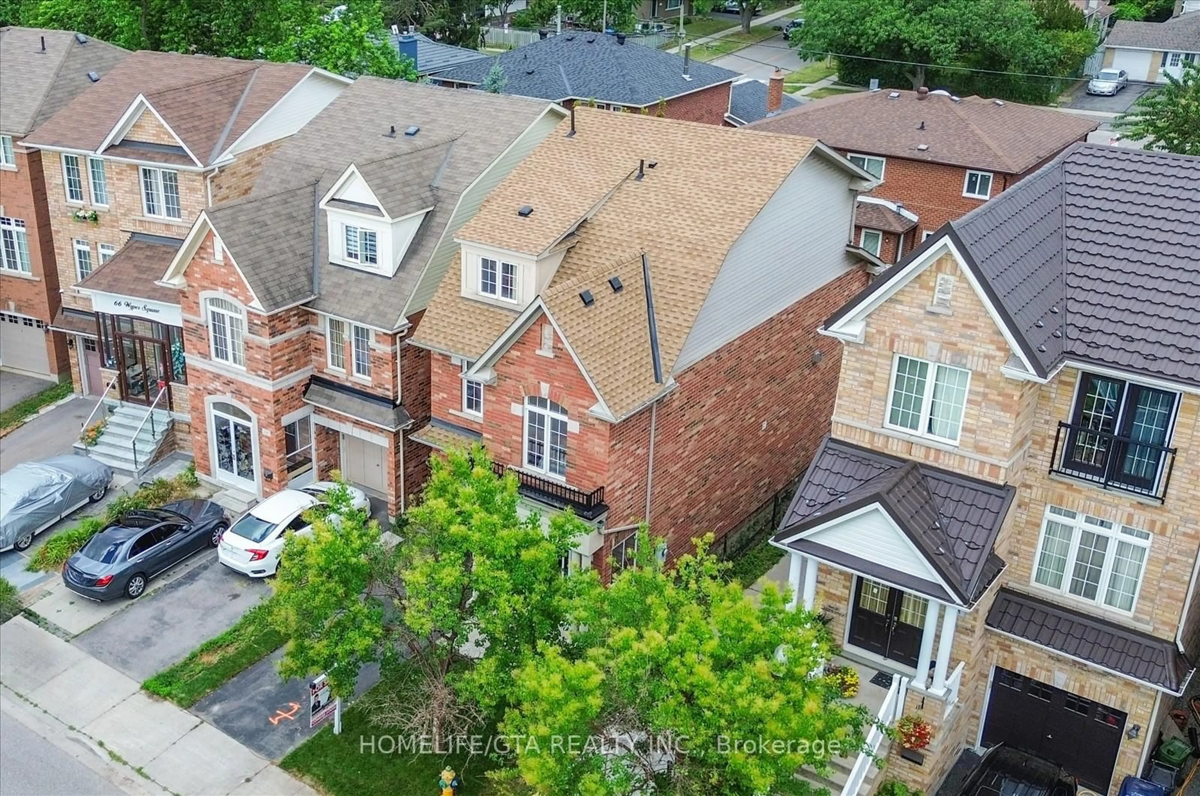 A pic from outside/outdoor area/front of a property/back of a property/a pic from drone, city buildings view from balcony for 62 Wyper Sq, Toronto Ontario M1S 0B3