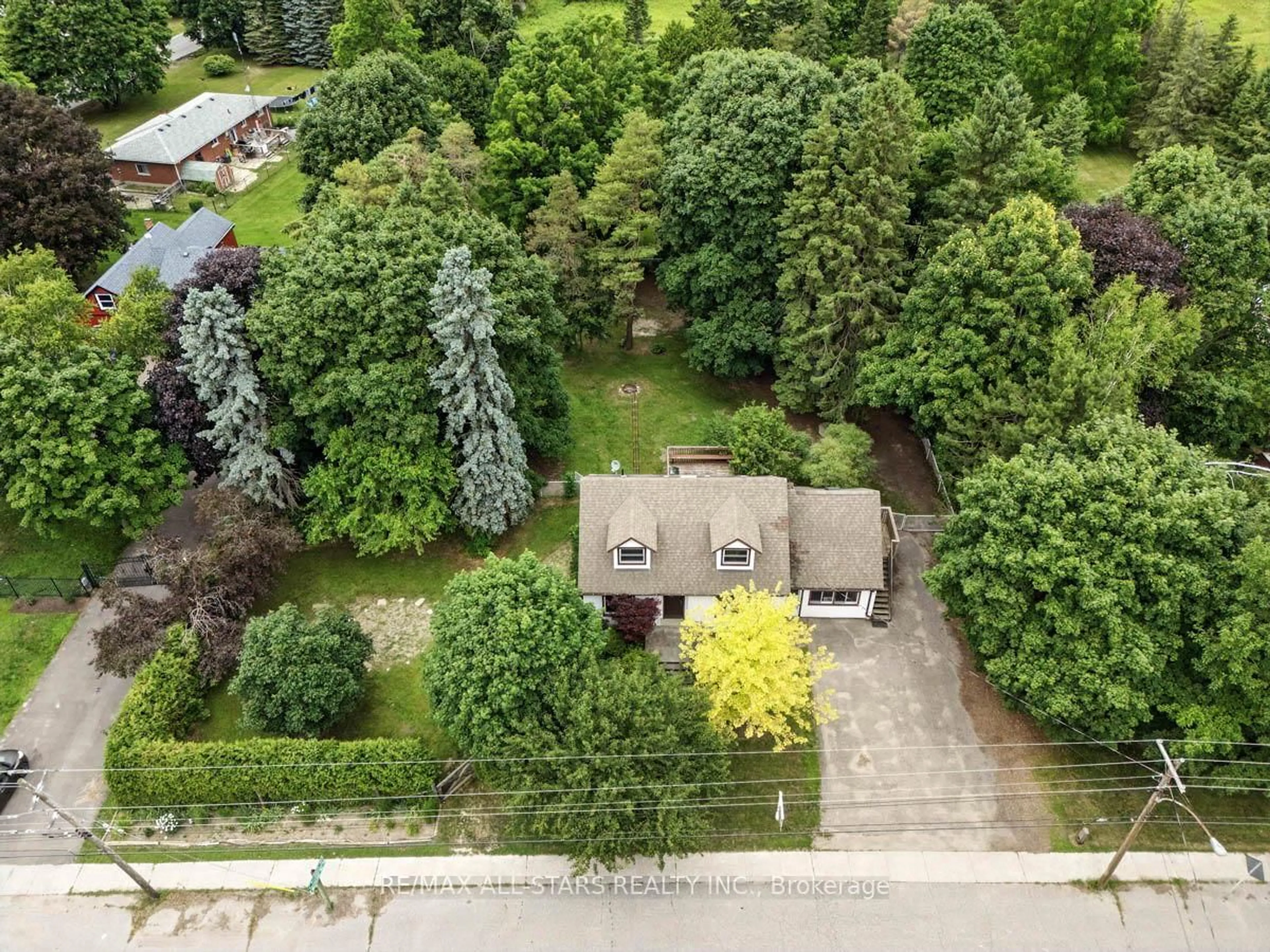 A pic from outside/outdoor area/front of a property/back of a property/a pic from drone, street for 4015 Highway 7A Rd, Scugog Ontario L0B 1L0