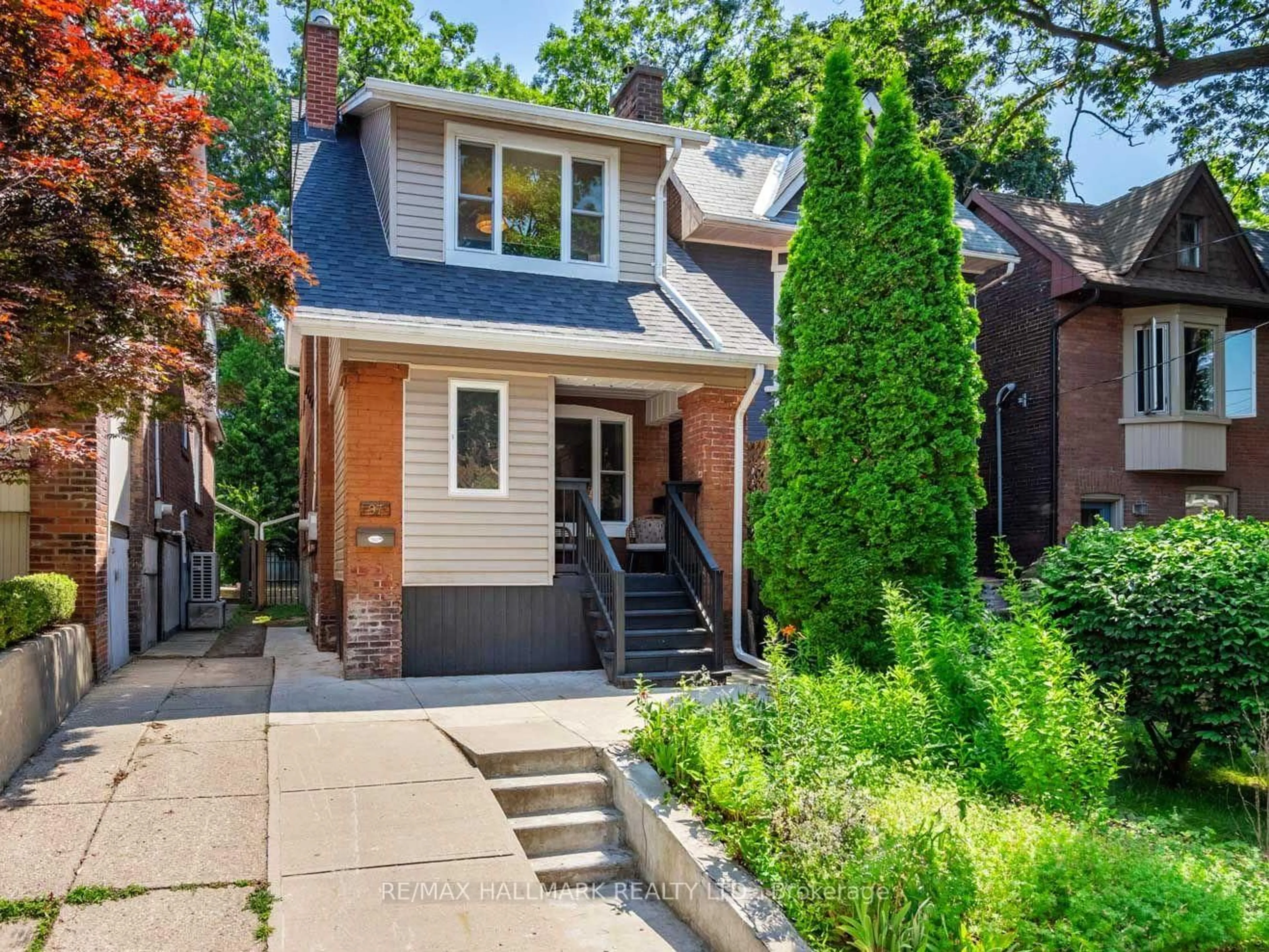 Home with brick exterior material, street for 97 Bowmore Rd, Toronto Ontario M4L 3J1
