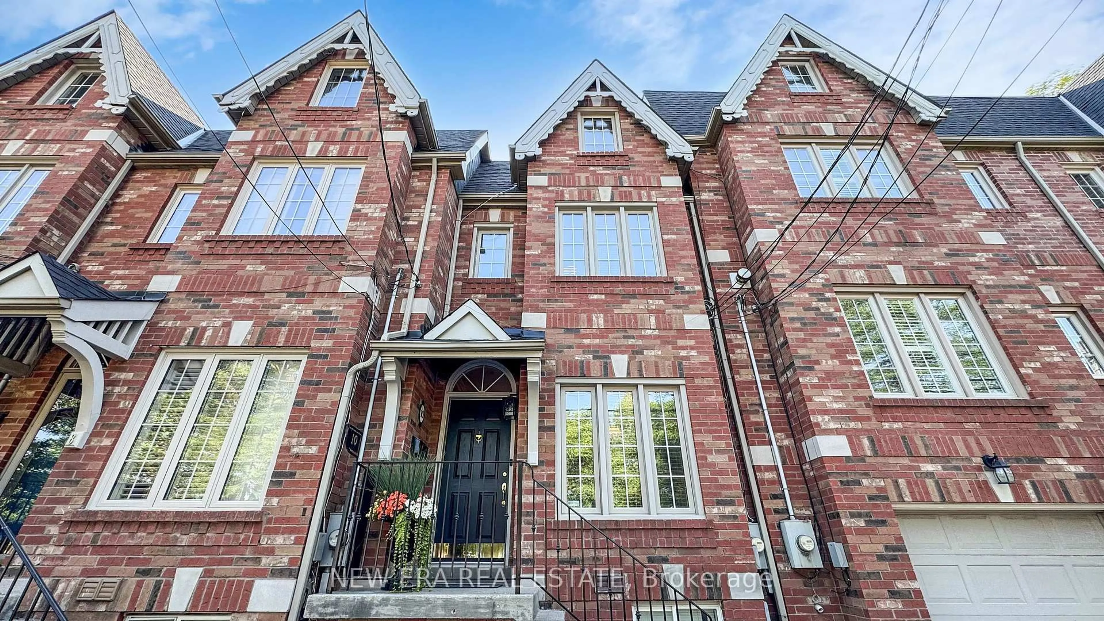 Home with brick exterior material, street for 10 Cam Fella Lane, Toronto Ontario M4L 3Z5