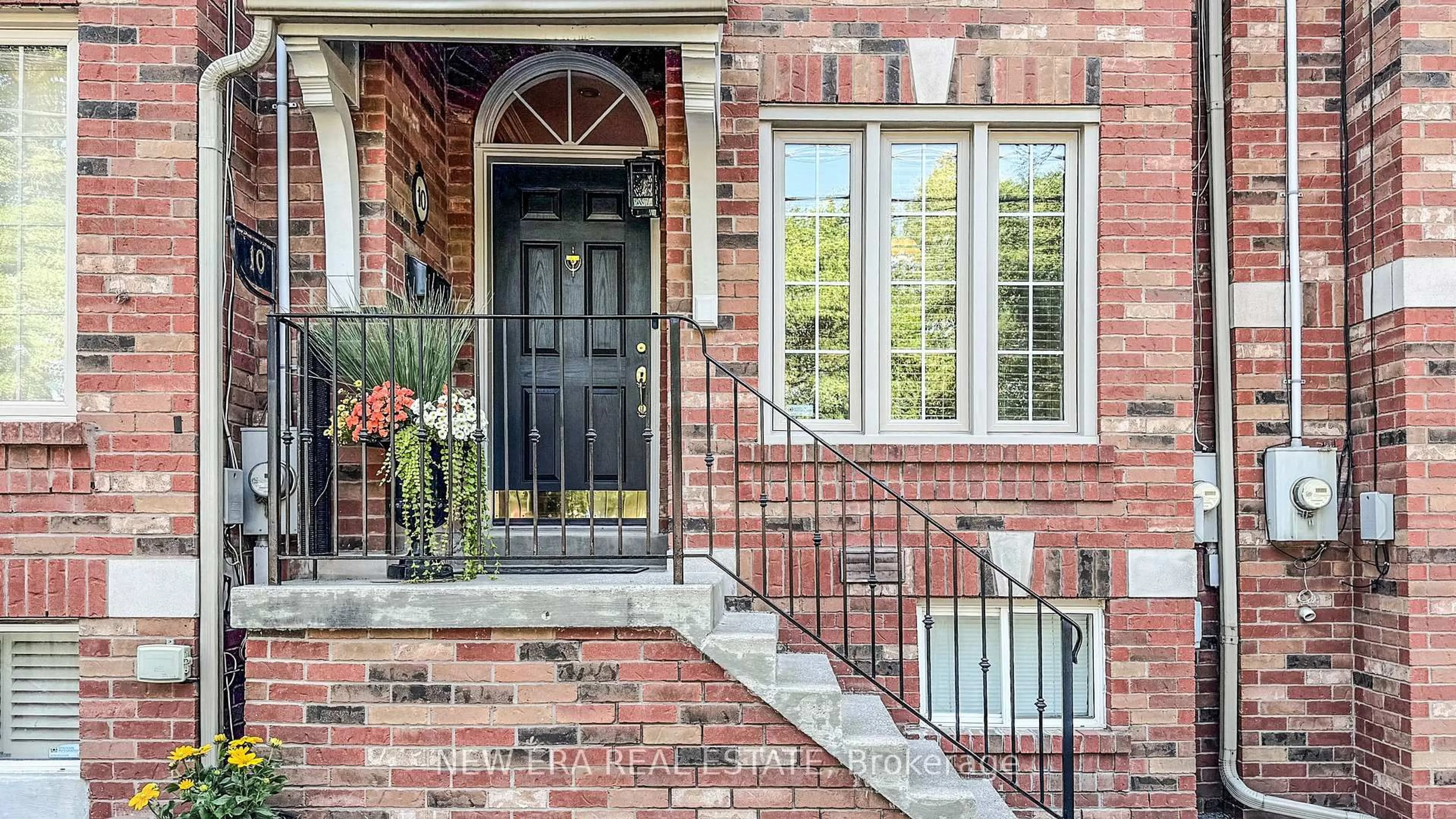 Home with brick exterior material, street for 10 Cam Fella Lane, Toronto Ontario M4L 3Z5