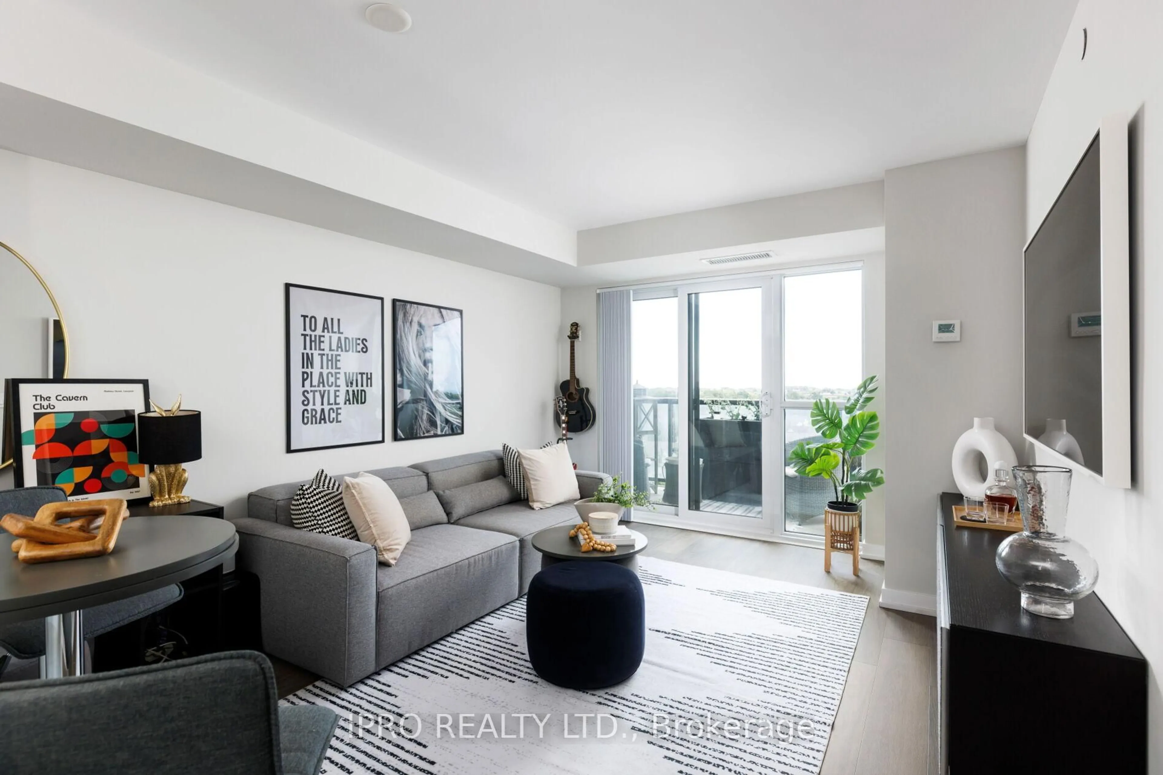 Living room with furniture, unknown for 8 Trent Ave #807, Toronto Ontario M4C 0A6