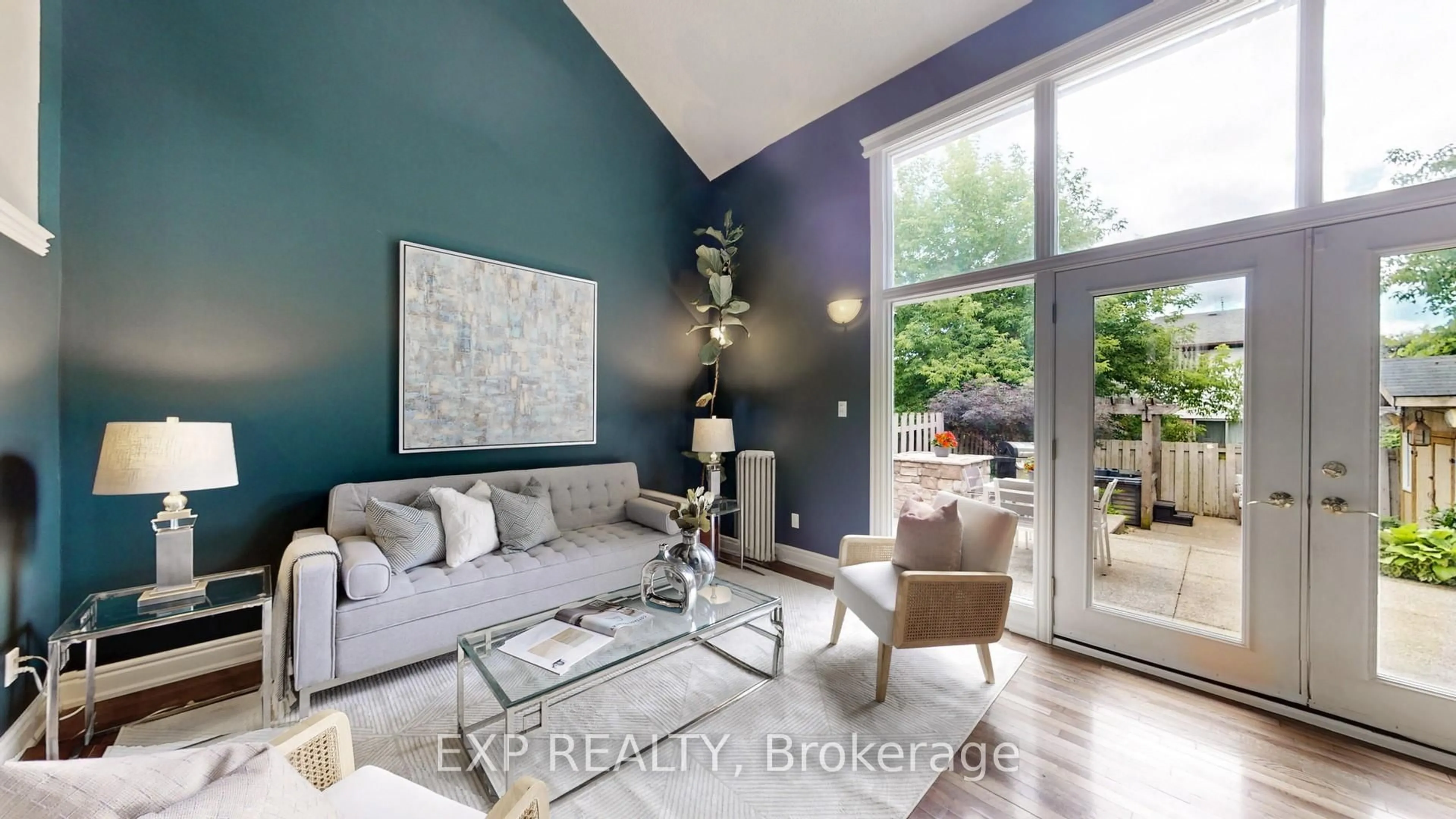 Living room with furniture, wood/laminate floor for 1258 Canborough Cres, Pickering Ontario L1V 3L1