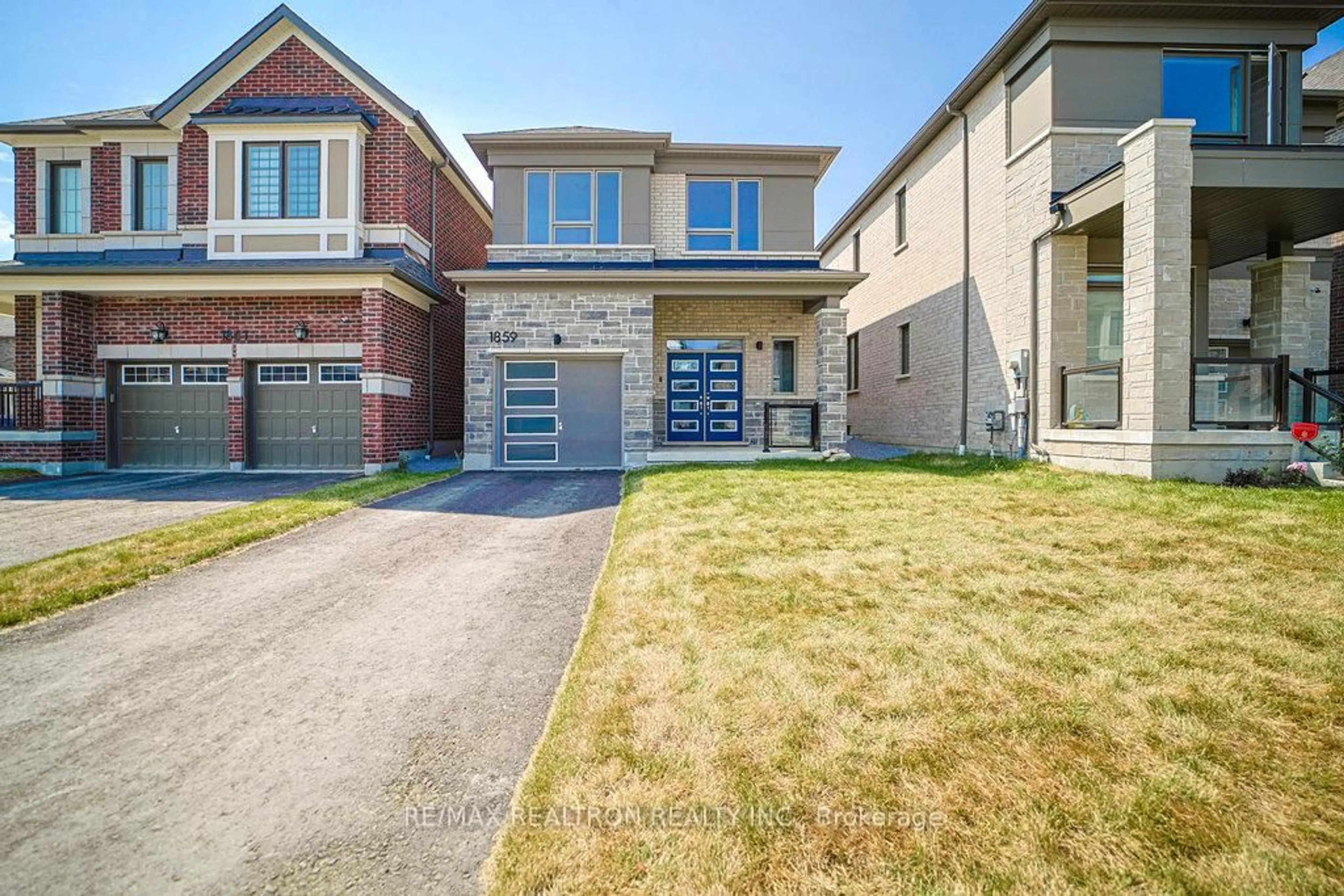 Home with brick exterior material, street for 1859 Weeping Willow Lane, Pickering Ontario L1X 0K6