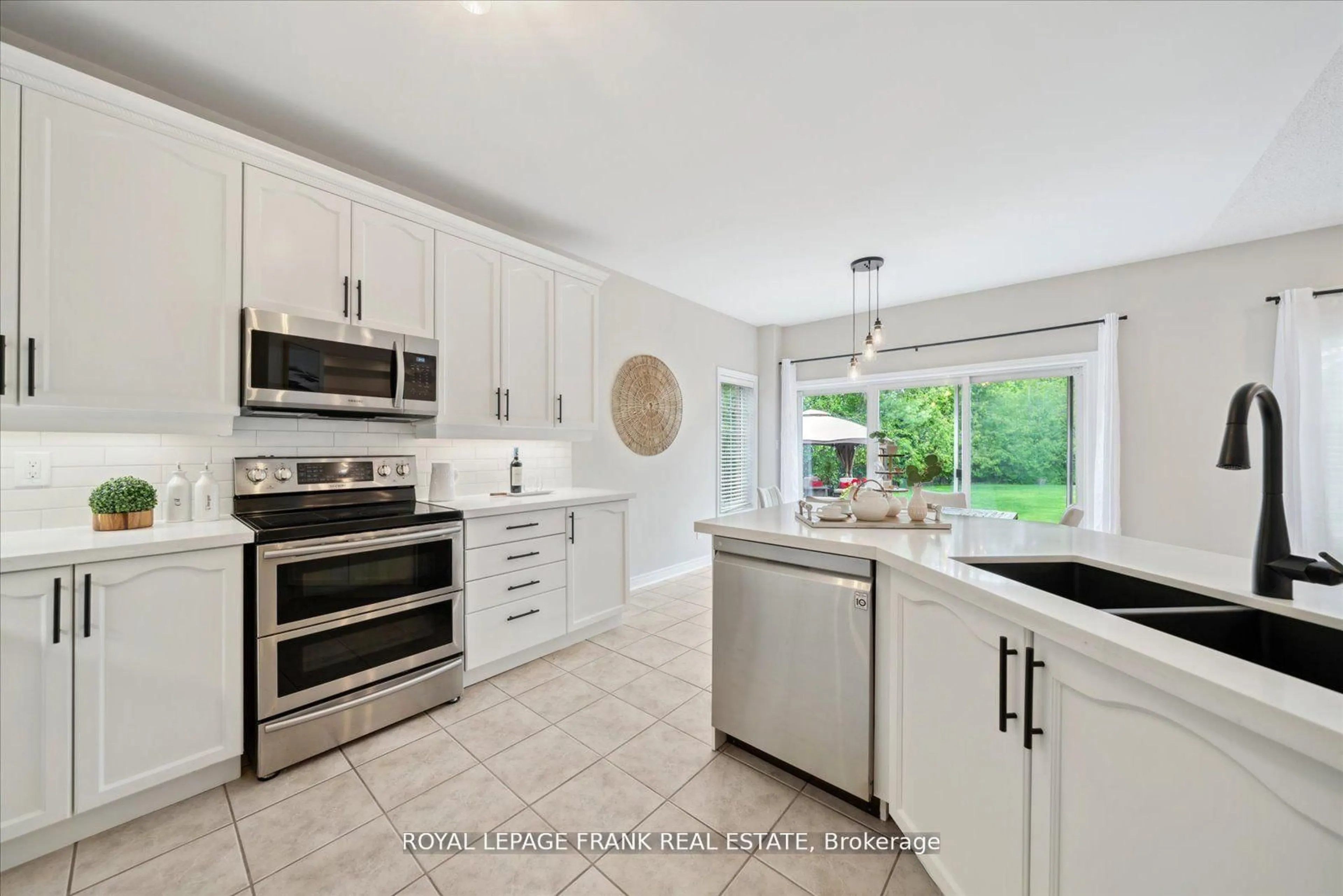 Open concept kitchen, ceramic/tile floor for 24 James Rowe Dr, Whitby Ontario L1R 2X8