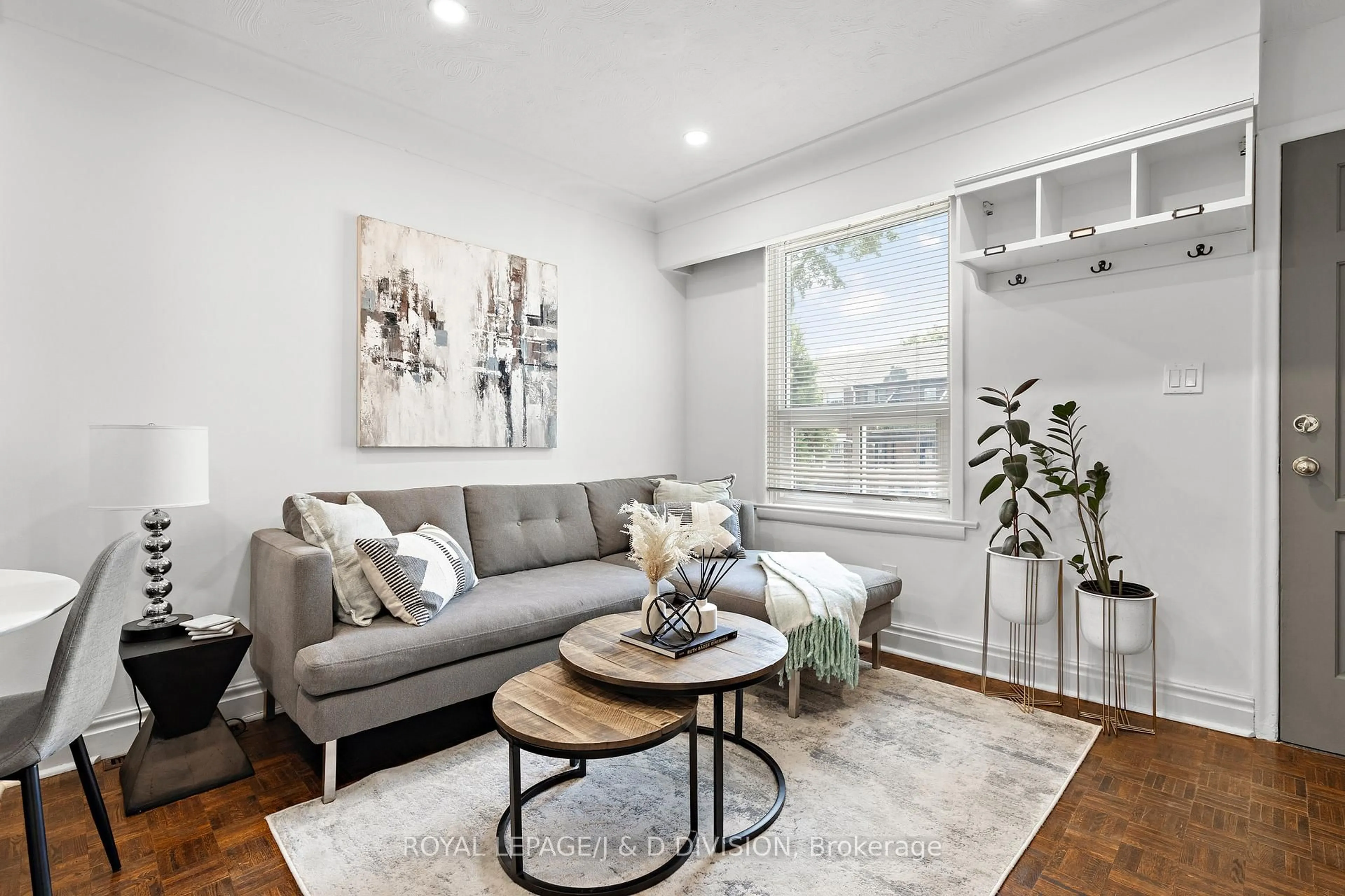 Living room with furniture, unknown for 123 Drayton Ave, Toronto Ontario M4C 3L8