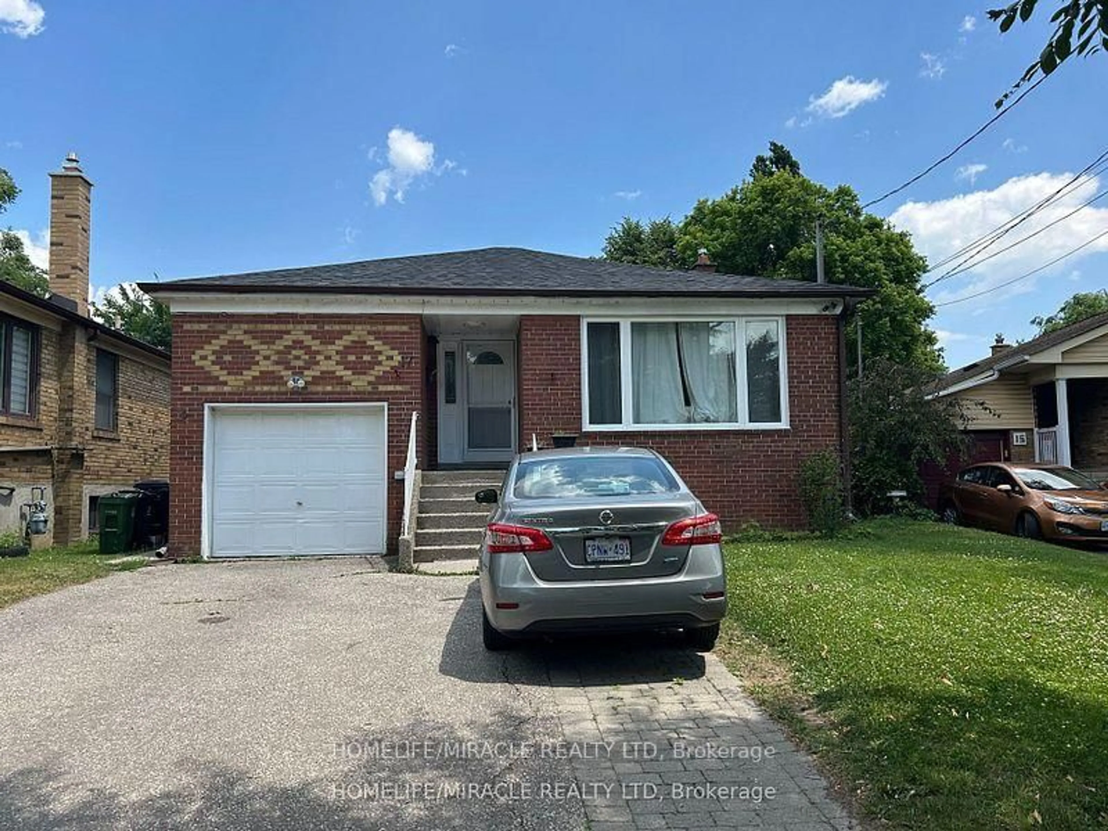 Home with brick exterior material, street for 17 Montvale Dr, Toronto Ontario M1M 3E5