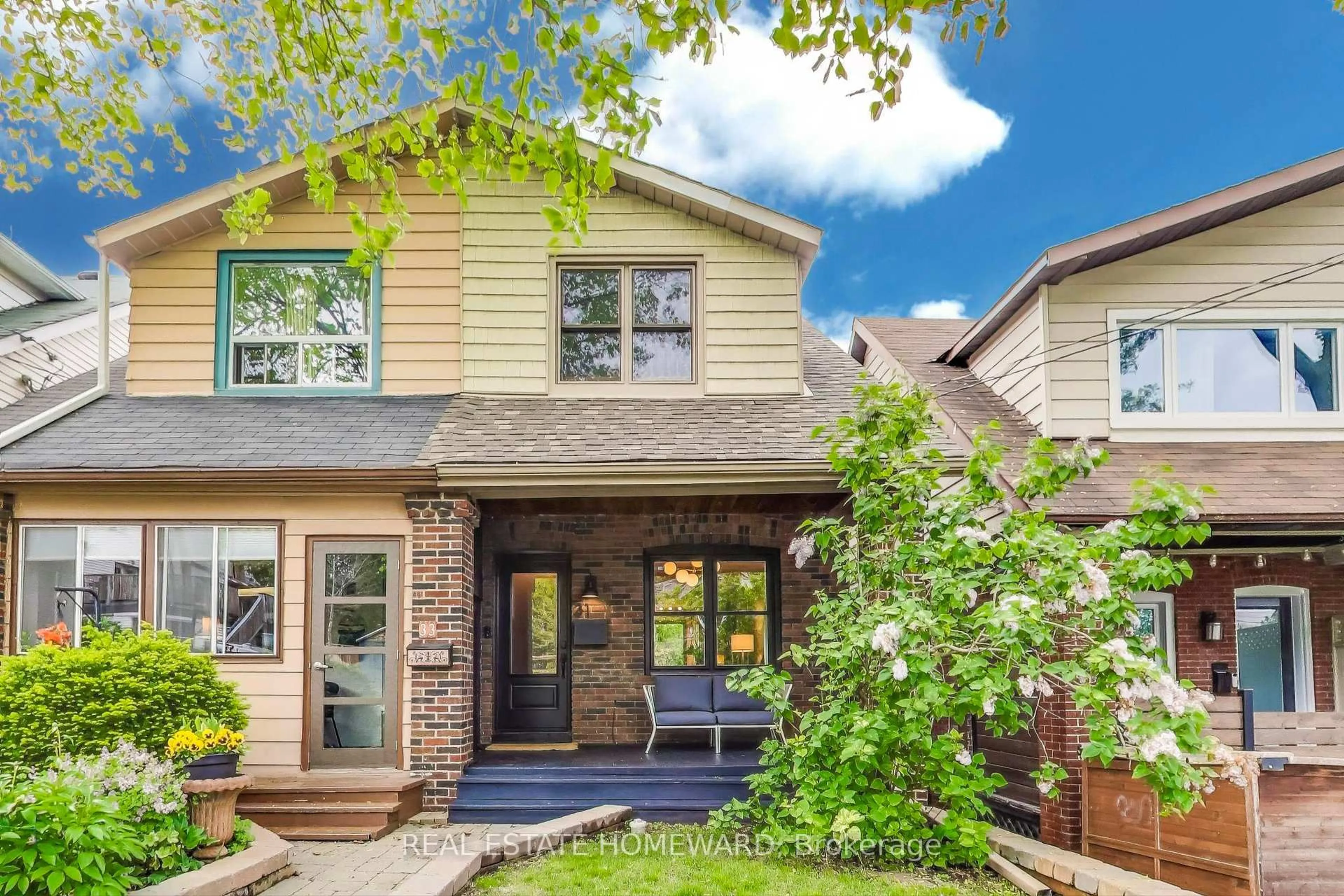 Home with brick exterior material, street for 31 Glenmore Rd, Toronto Ontario M4L 3M1