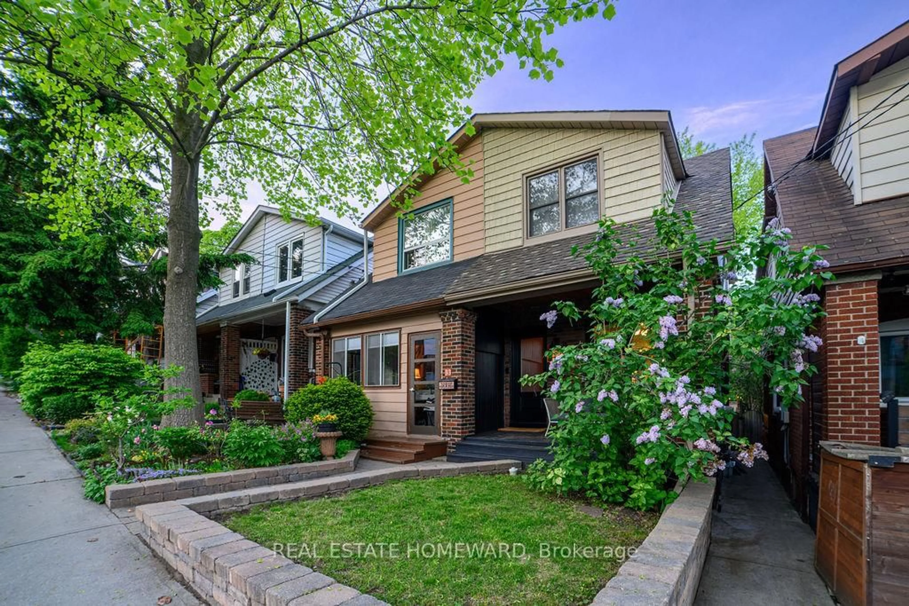 Home with brick exterior material, street for 31 Glenmore Rd, Toronto Ontario M4L 3M1