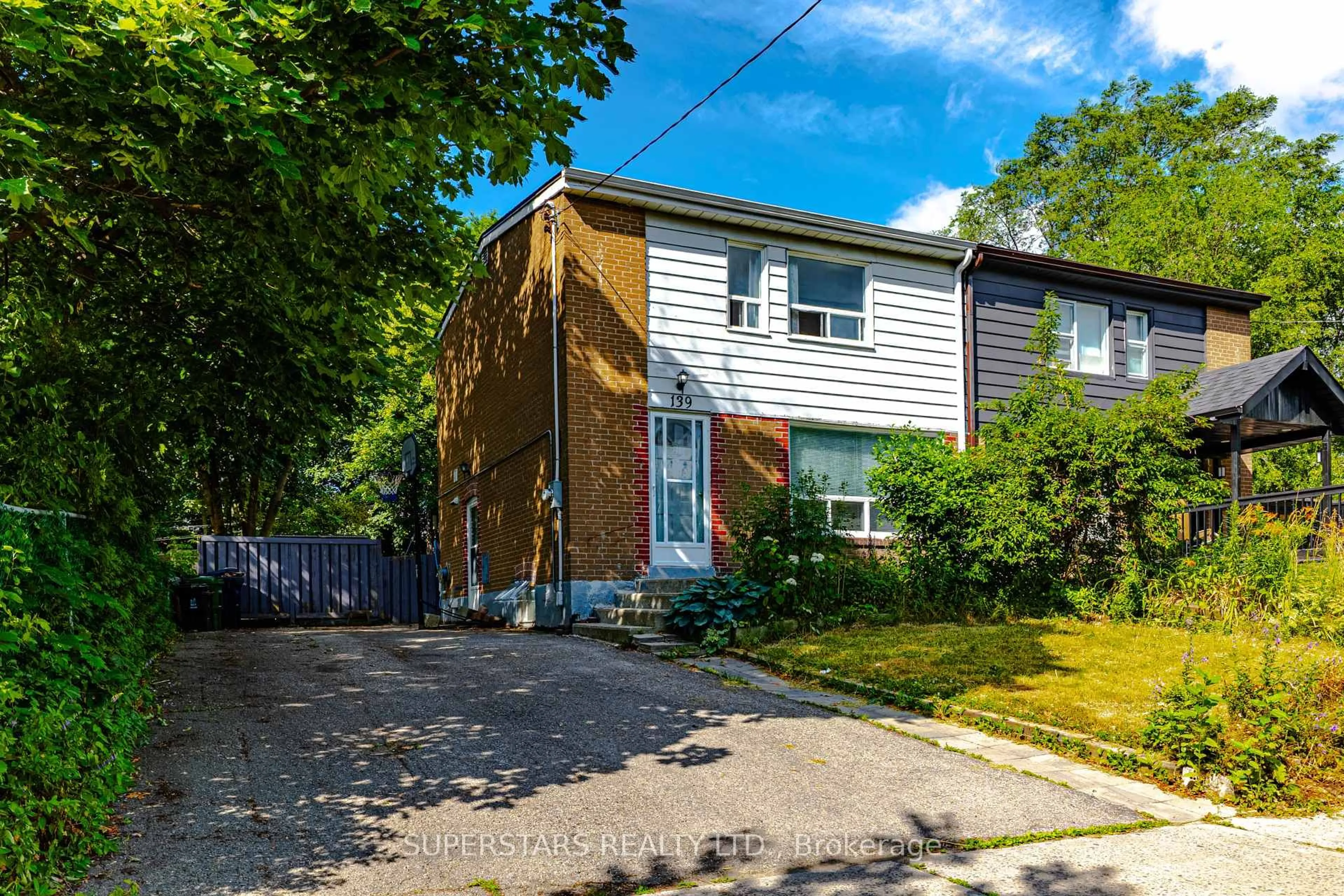 Home with vinyl exterior material, street for 139 Woodfern Dr, Toronto Ontario M1K 2L4