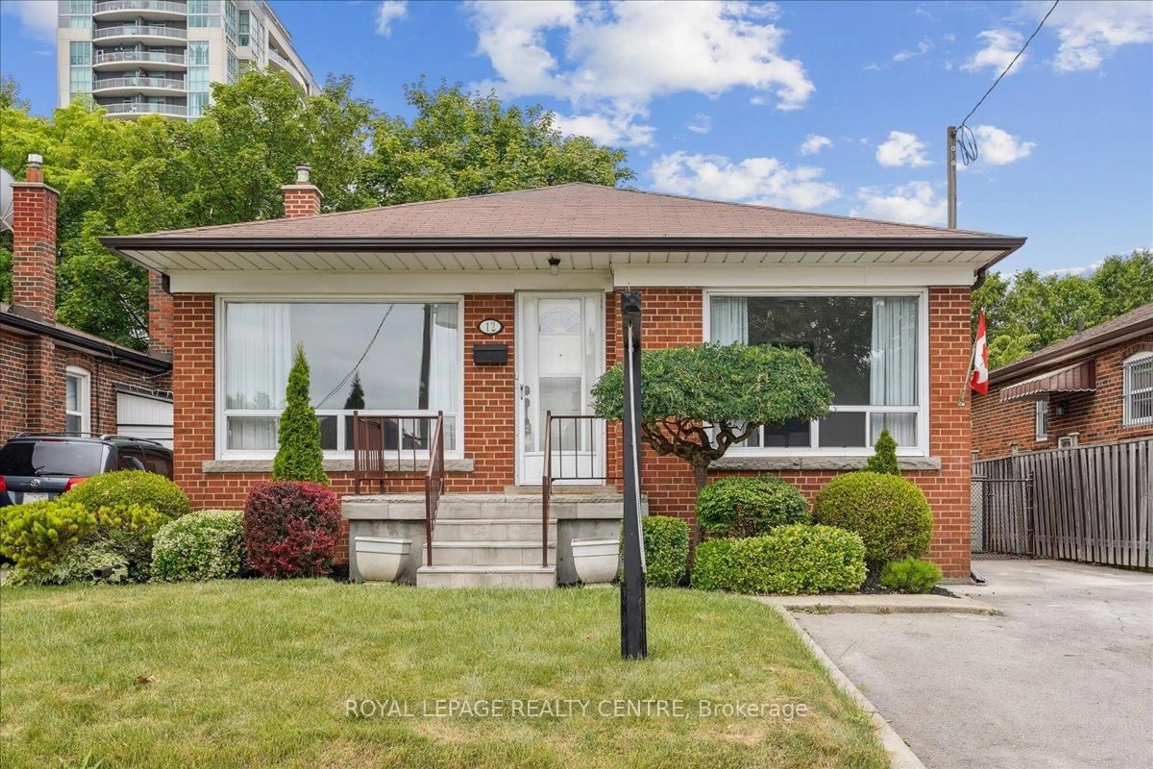 Home with brick exterior material, street for 12 Beacon Rd, Toronto Ontario M1P 1G7
