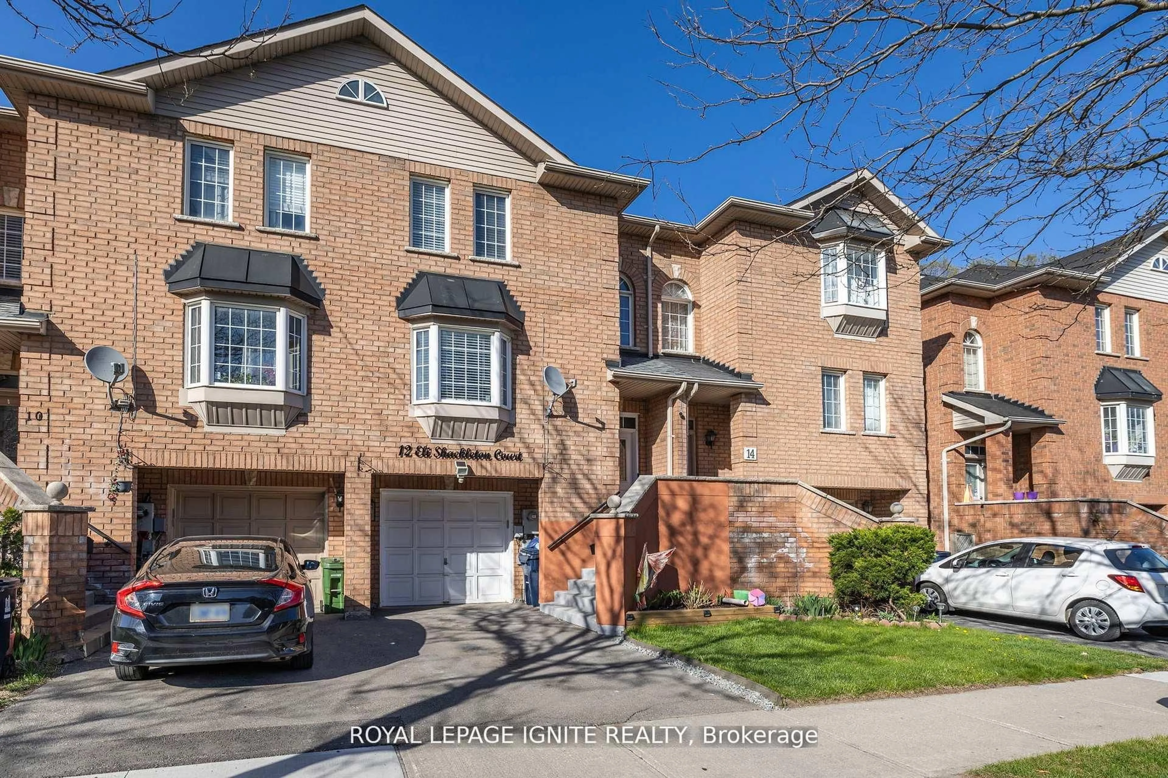 Home with brick exterior material, street for 12 Eli Shackleton Crt, Toronto Ontario M1E 5K3