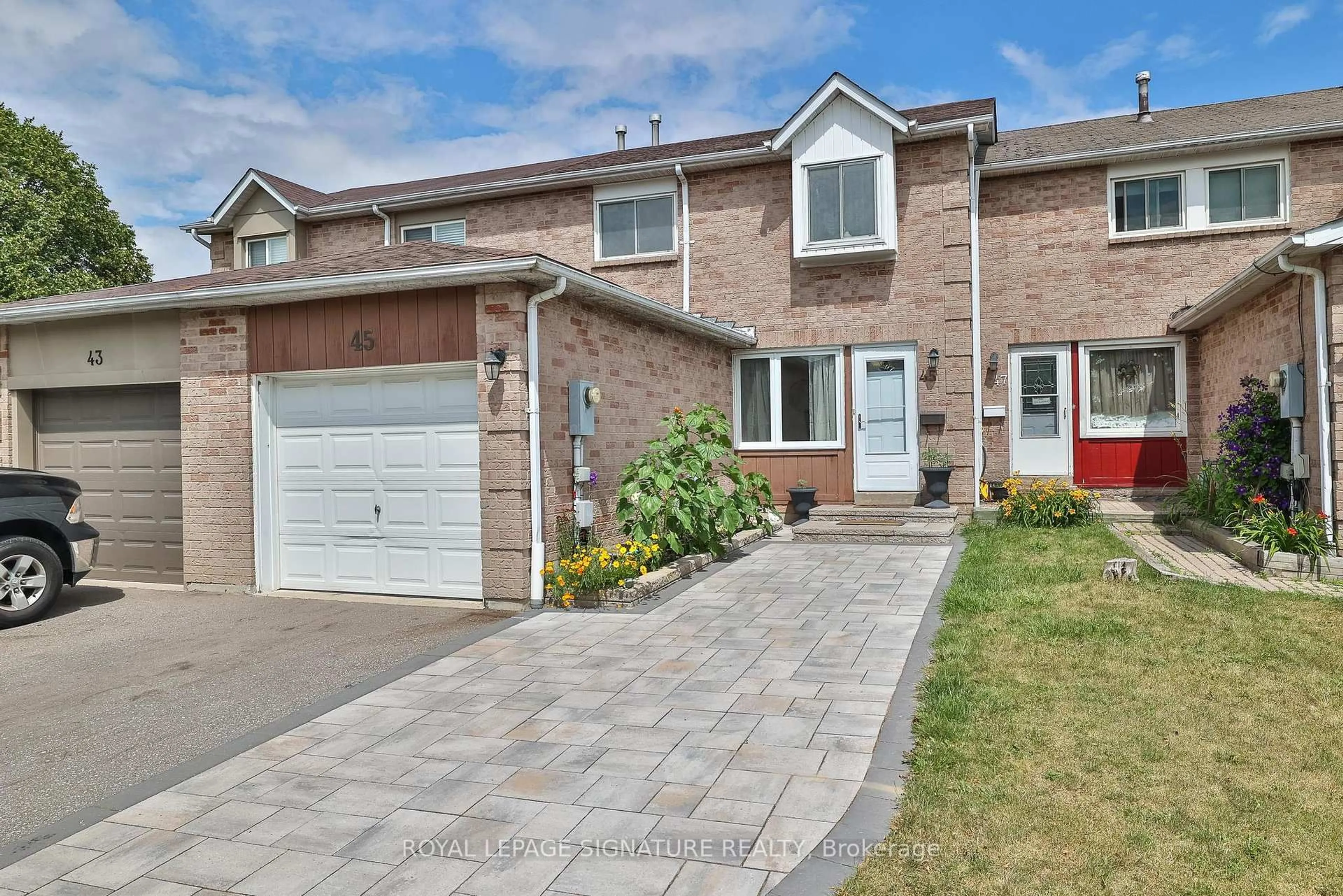 Home with brick exterior material, street for 45 Tams Dr, Ajax Ontario L1Z 1A3